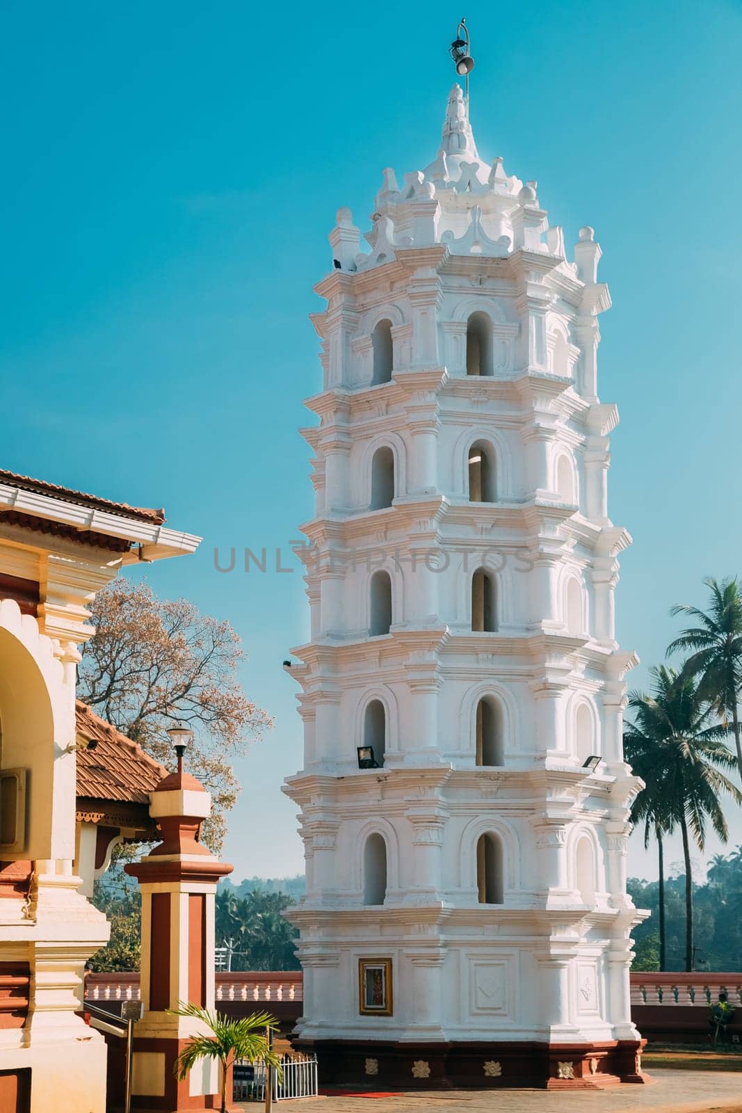 Kavlem, Phonda, Goa, India. Shree Shantadurga Mandir, Kavlem Temple. Famous Landmark And Popular Destination. White Lamp Tower. Shantadurga Devi.