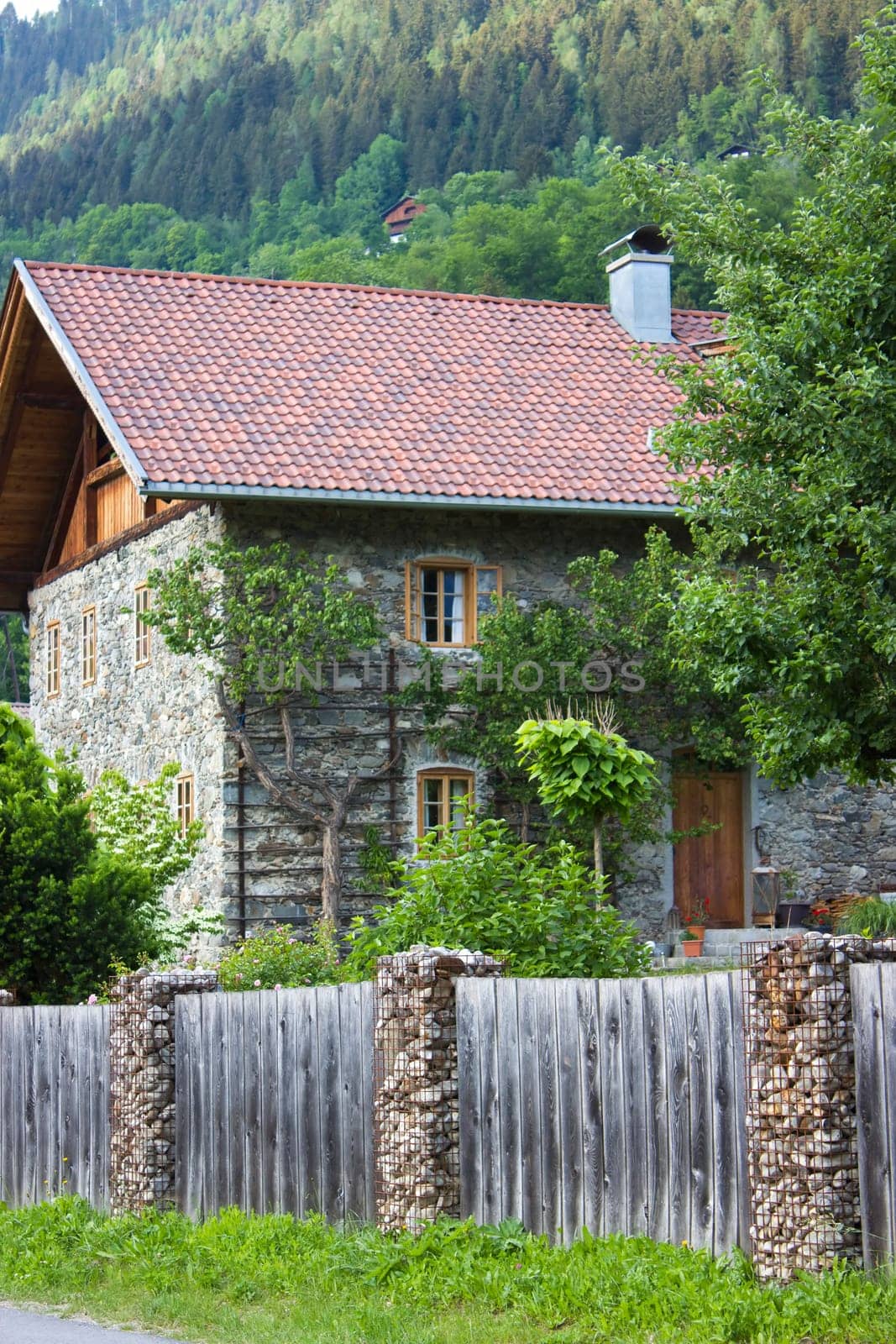 A traditional stone house in the alpine village of Doelsach, East Tyrol, Austria