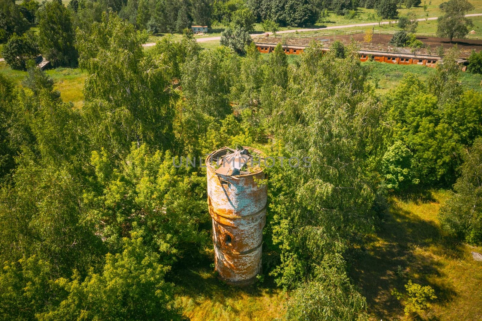 Belarus. Aerial View Of Ruined Water Tower In Chernobyl Zone. Chornobyl Catastrophe Disasters. Dilapidated House In Belarusian Village. Whole Villages Must Be Disposed. Chernobyl Resettlement Zone.