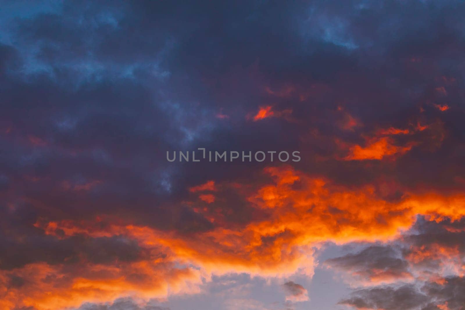 Sunrise Bright Dramatic Sky. Scenic Colorful Sky At Dawn. Sunset Sky Natural Abstract Background In Blue Pink Red Orange Colors