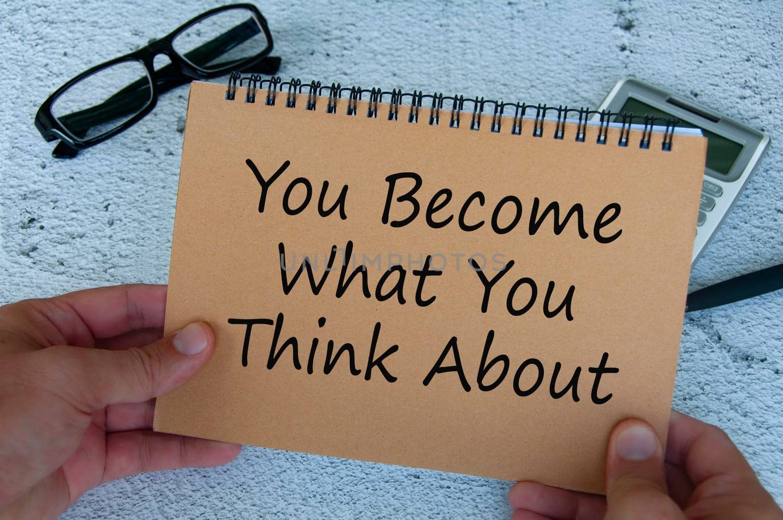 You become what you think about text written on brown notepad. Motivational and inspirational concept.