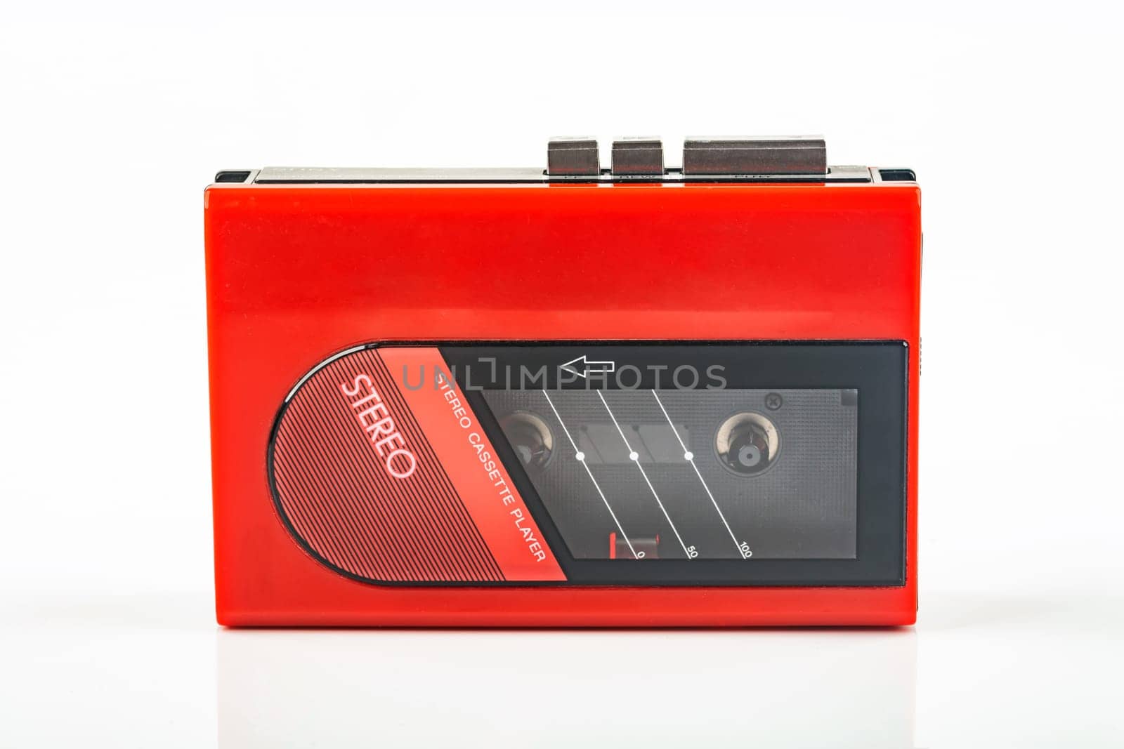 Beautiful red vintage audio cassette player over white background