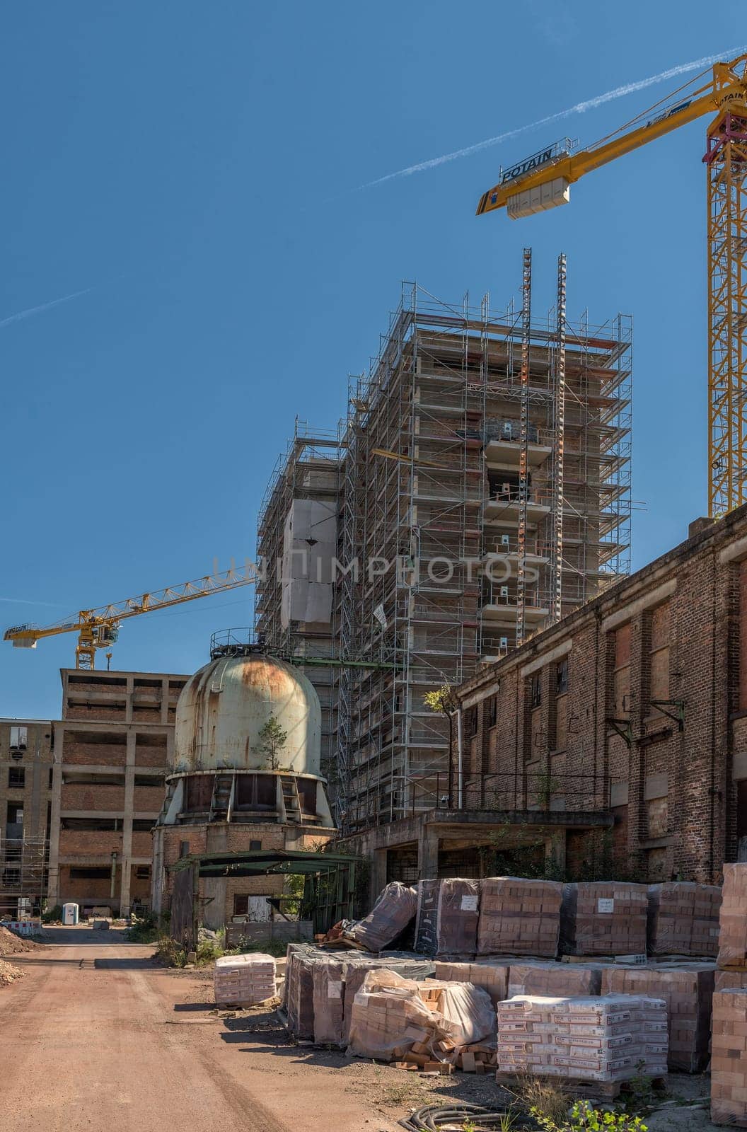 Restoration and conversion Restoration of an old factory site into apartments