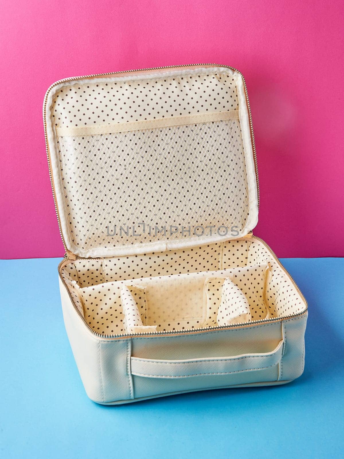 empty open white makeup bag close-up. High quality photo