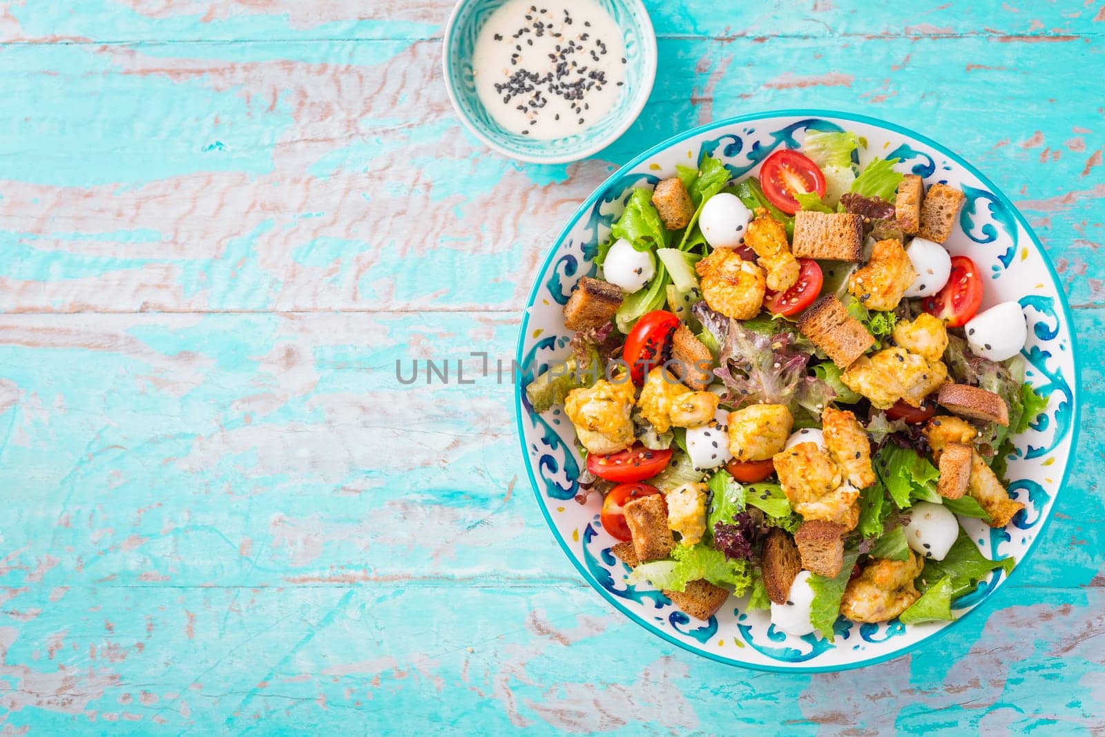 Healthy Grilled Chicken Caesar Salad with Cheese and Croutons