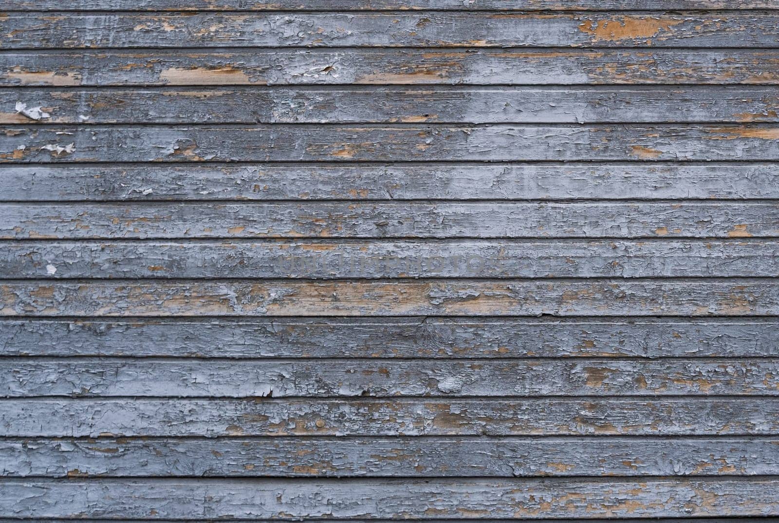 The textured wooden backdrop aged
