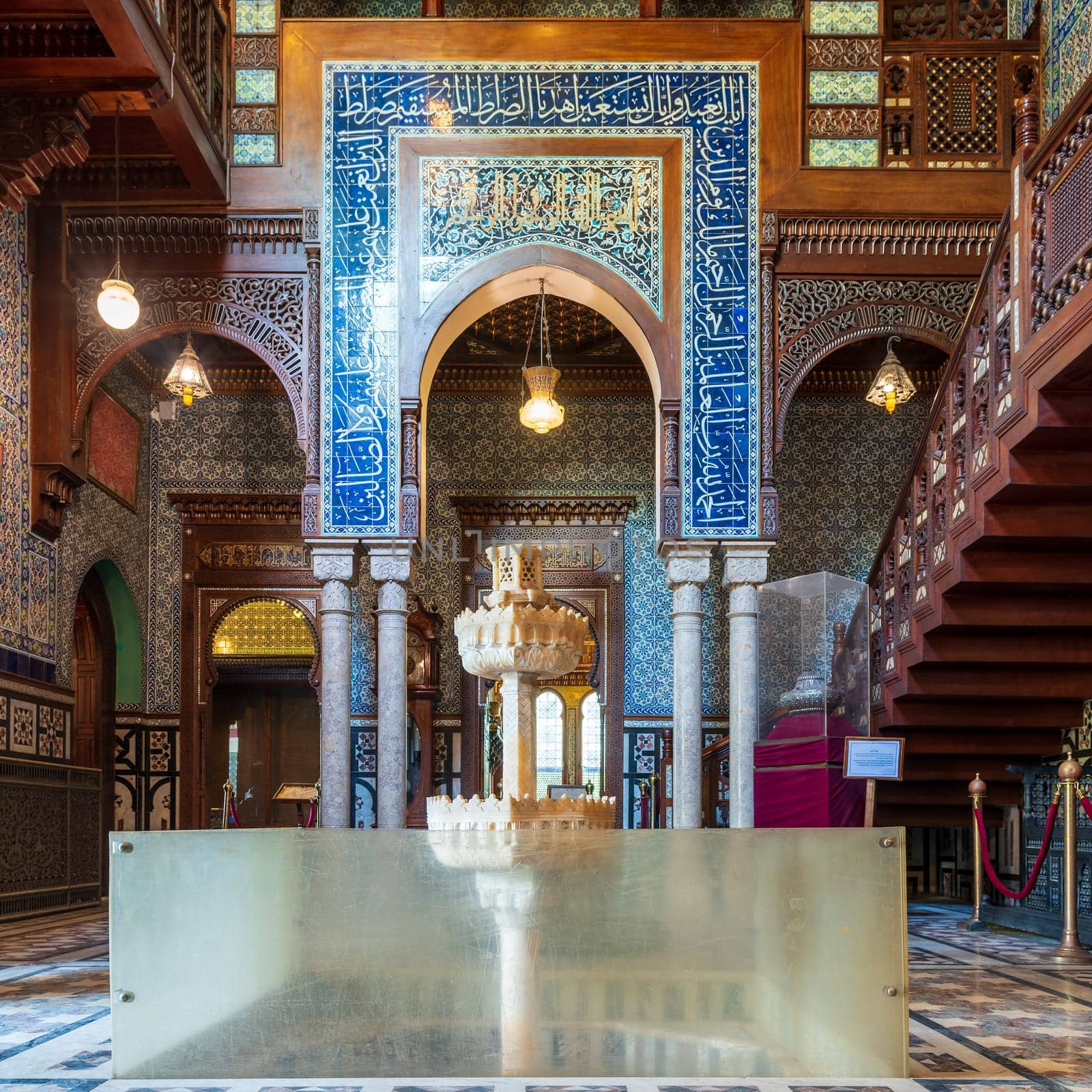 Cairo, Egypt- December 2 2017: Manial Palace of Prince Mohammed Ali. Main hall of the residence building with Turkish floral blue pattern ceramic tiles and vintage furniture, Cairo, Egypt