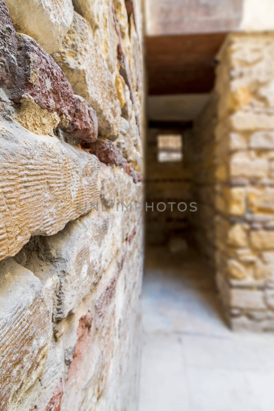 Blurred shot of old abandoned stone bricks passage, Old Cairo, Egypt