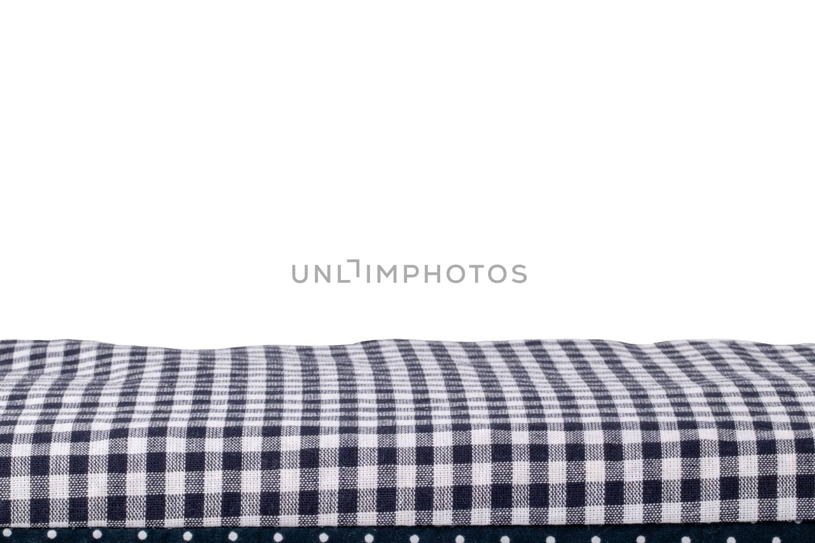 Closeup of a cherry pit filled pillow for pain and tension isolated on white background. Copy space for your product presentation montage. Macro.
