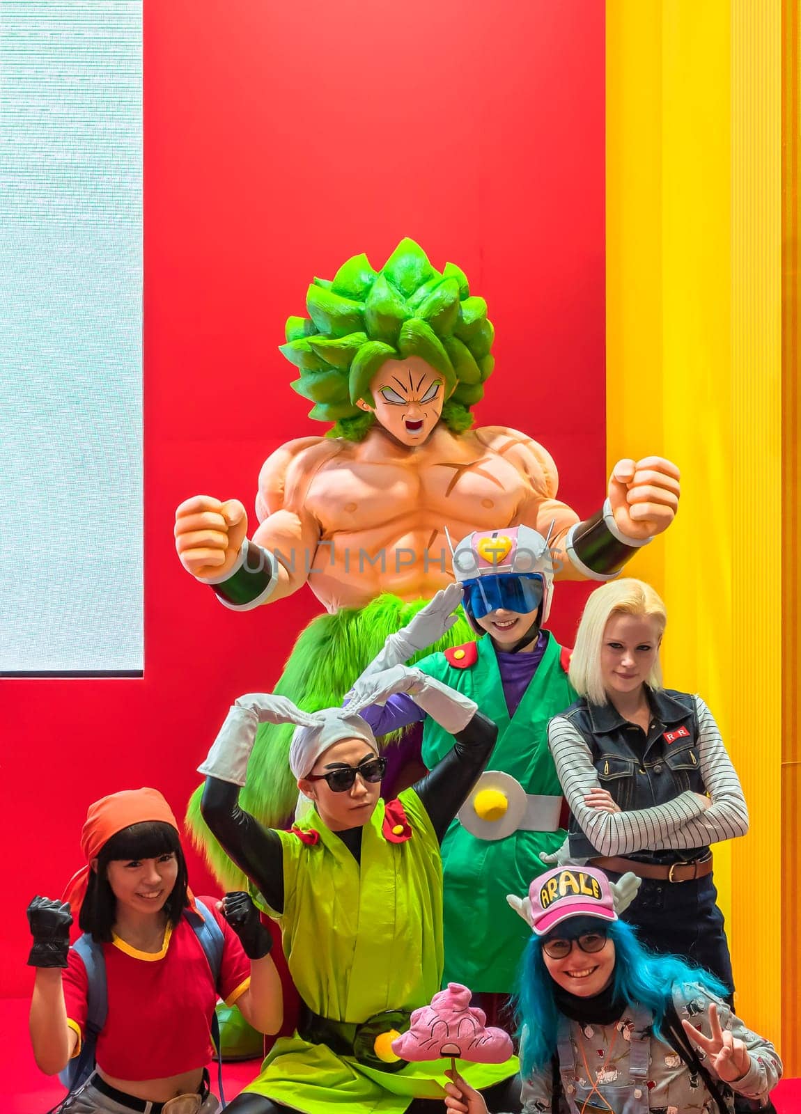 chiba, japan - december 22 2018: Group of young cosplayers wearing costumes and wigs of the characters of the Japanese manga and anime series of Dragon Ball during the convention Jump Festa 19.