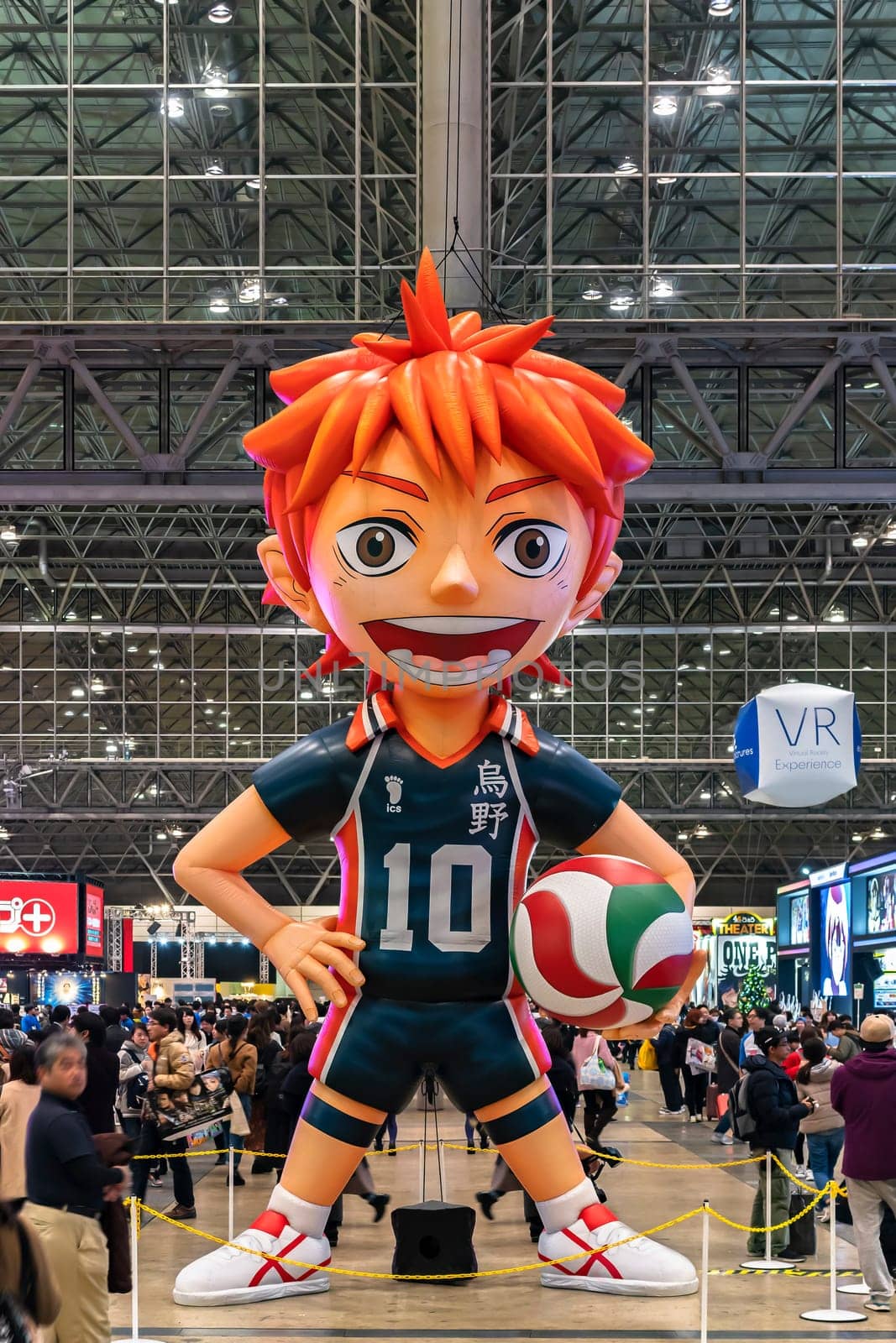 chiba, japan - december 22 2018: Huge inflatable structure of the character Shoyo Hinata from the anime and manga serie of Haikyu!! standing under the ceiling of the anime convention Jump Festa.
