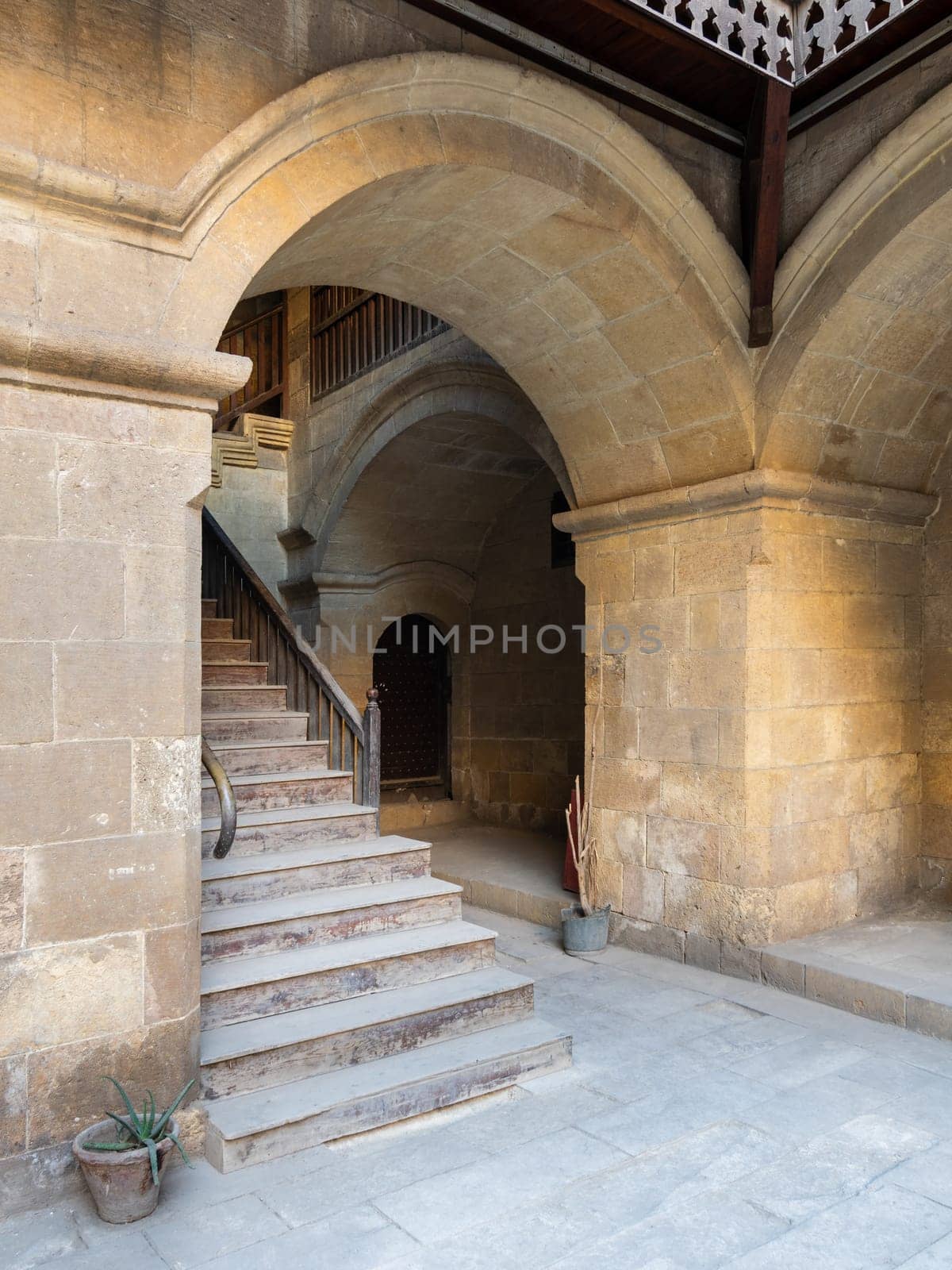 Exterior daylight shot of staircase going up leading to Caravansary - Wikala - of Bazaraa, suited in Gamalia district, Medieval Cairo, Egypt