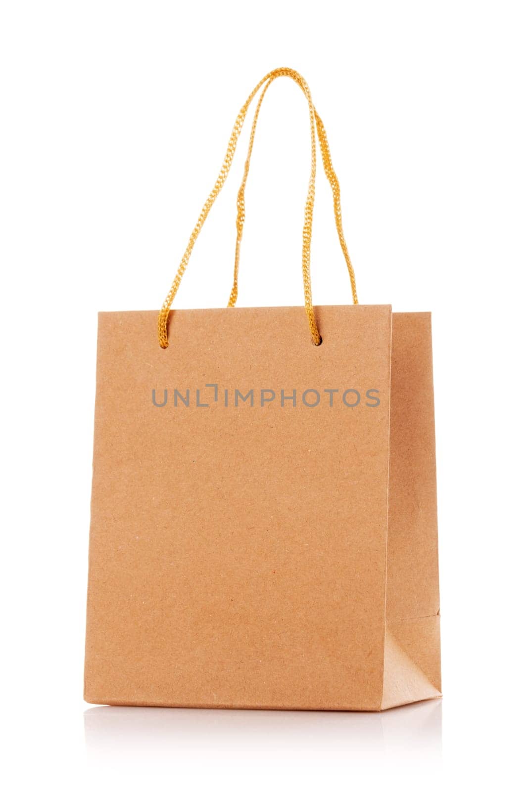 Blank shopping paper bags mockup. Empty cardboard craft bag on a white background. Consumer pack ready for logo design. Shopping and gifts concept.
