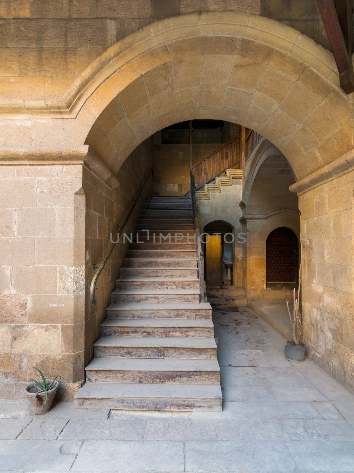 Exterior daylight shot of staircase going up leading to Caravansary - Wikala - of Bazaraa, suited in Gamalia district, Medieval Cairo, Egypt