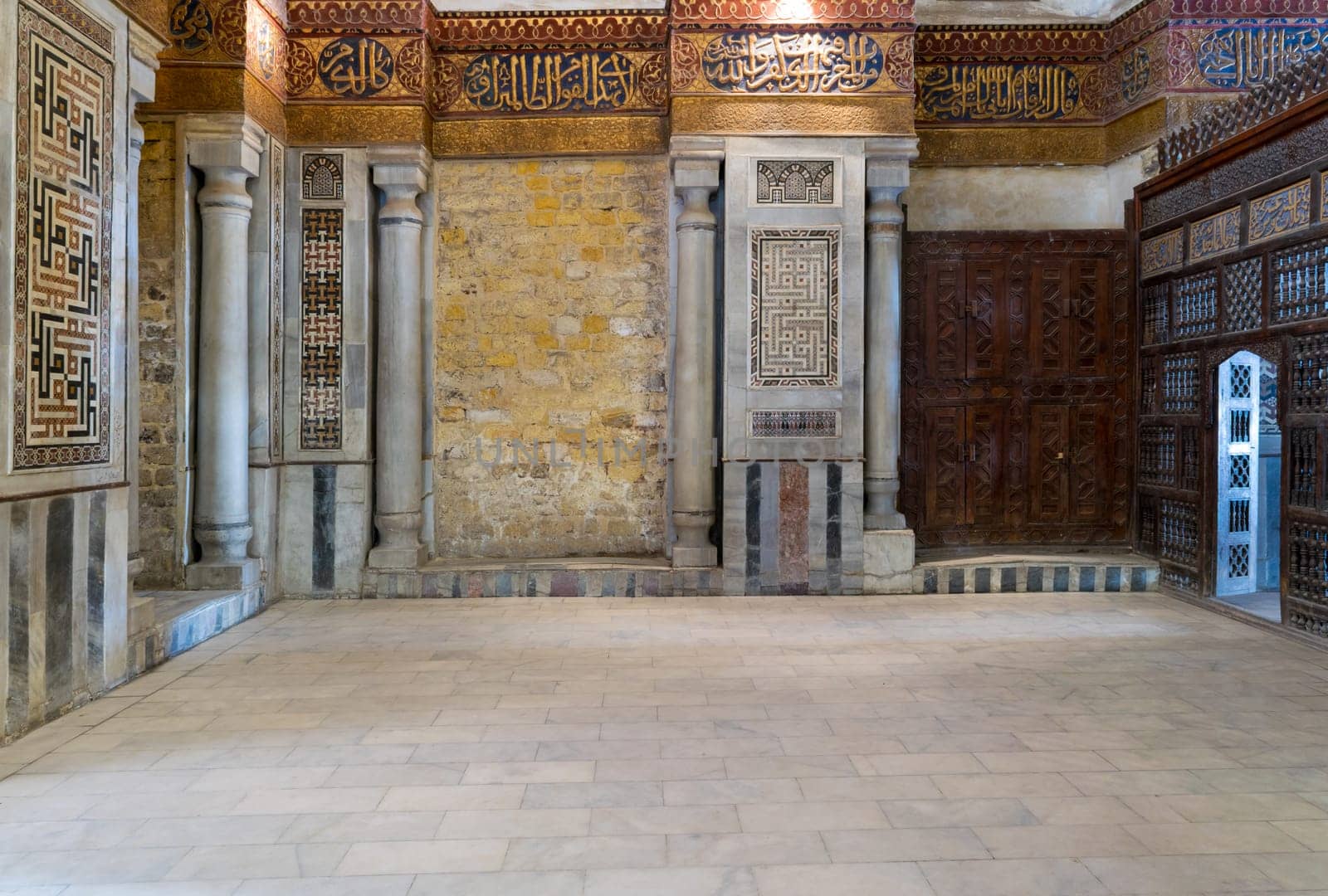 Interior view of decorated marble walls surrounding the cenotaph in the mausoleum of Sultan Qalawun, part of Sultan Qalawun Complex built in 1285 AD, located in Al Moez Street, Old Cairo, Egypt