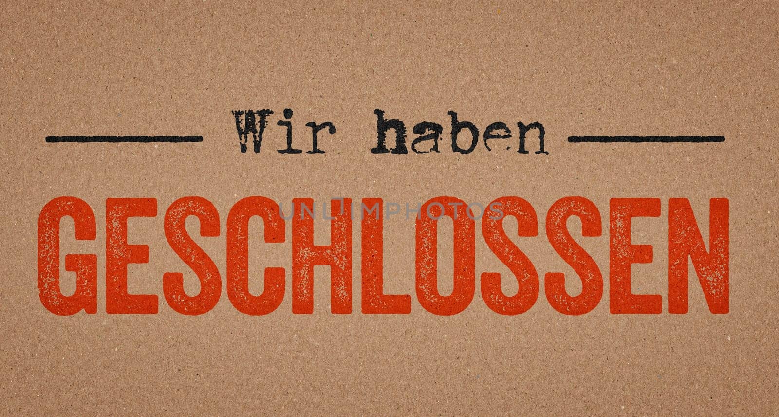 We are closed in german written on a retro paper background - Wir haben geschlossen