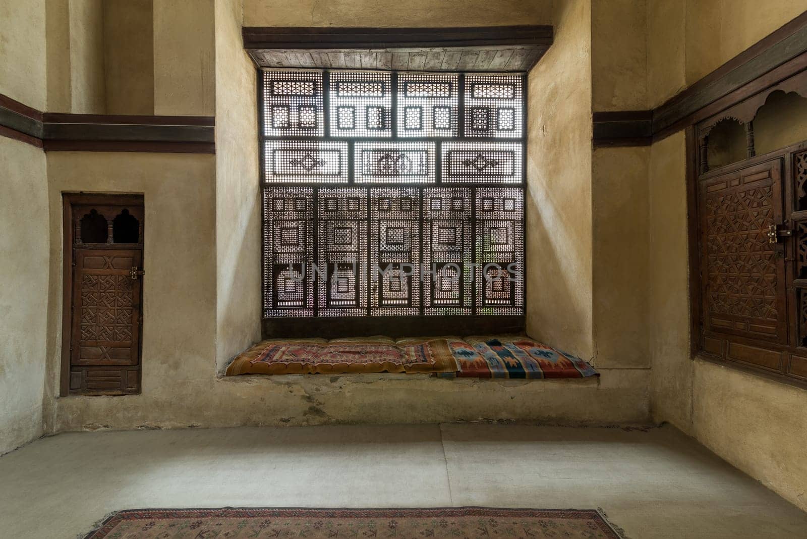 Hall at historic ottoman era El Sehemy house, with Interleaved wooden window - Mashrabiya, Moez Street, Medieval Cairo, Egypt