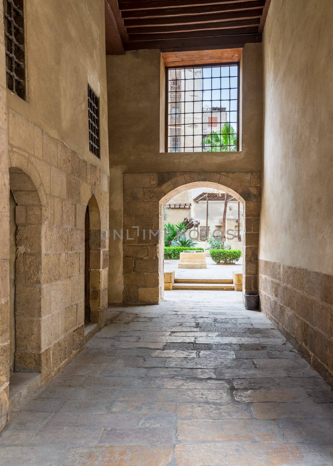 Stone bricks passage leading to the courtyard of historic Beit El Sehemy house located in Moez street, Gamalia district, Cairo, Egypt