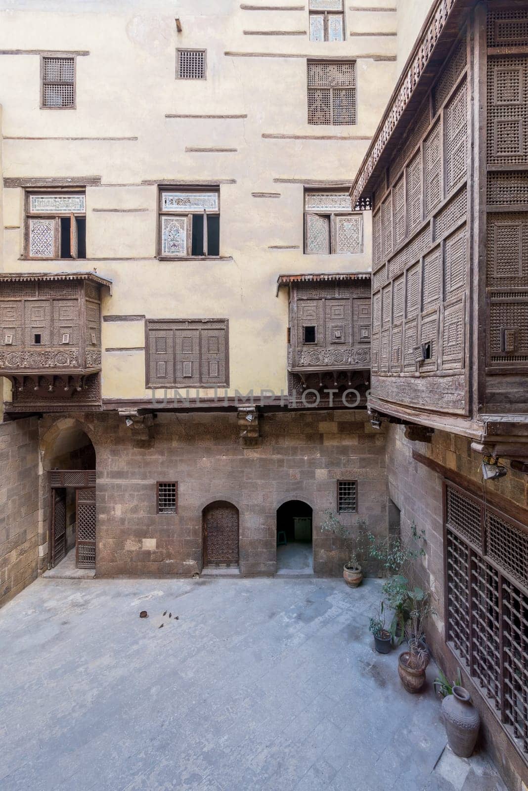 Facade of ottoman era historic house of Zeinab Khatoun with wooden oriel windows - Mashrabiya - located at Azhar district, Medieval Cairo, Egypt