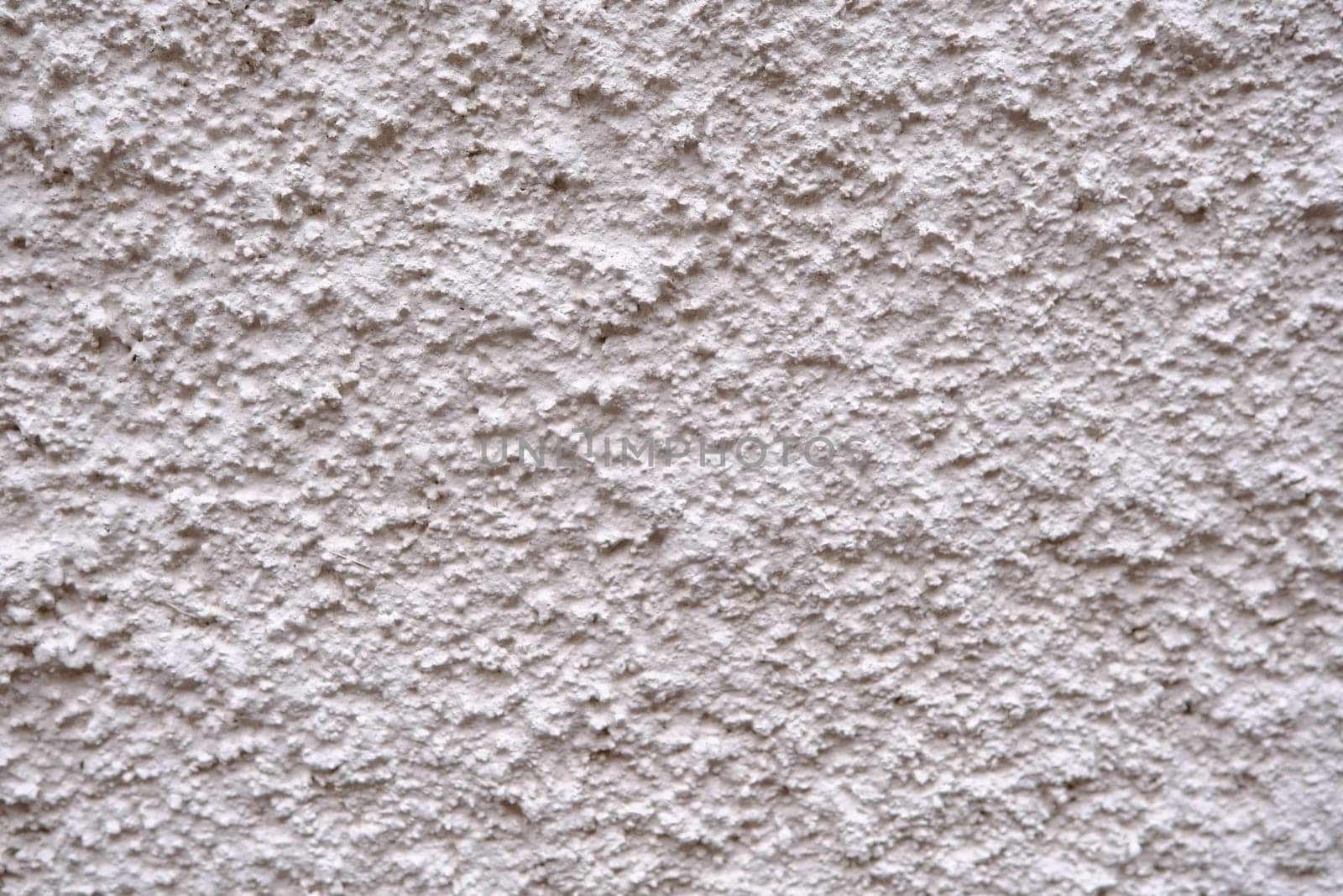 White Grunge Wall Background with rough texture.