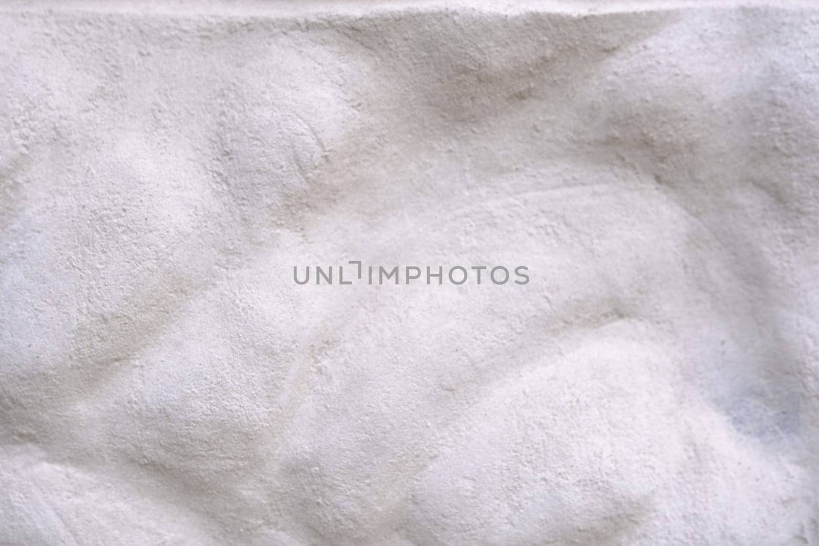 White Grunge Wall Background with rough texture.