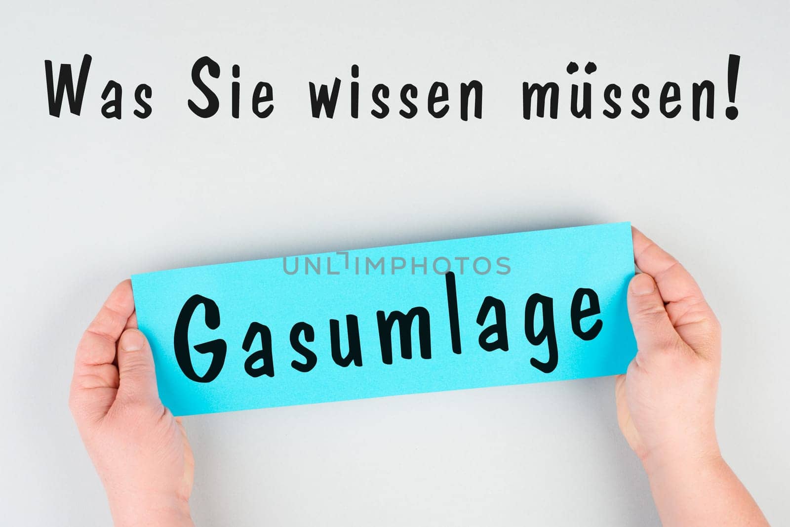 Gas commission is standing in german language on the paper, new fee regualtion in Germany, risk for impoverishment of the population, energy crisis