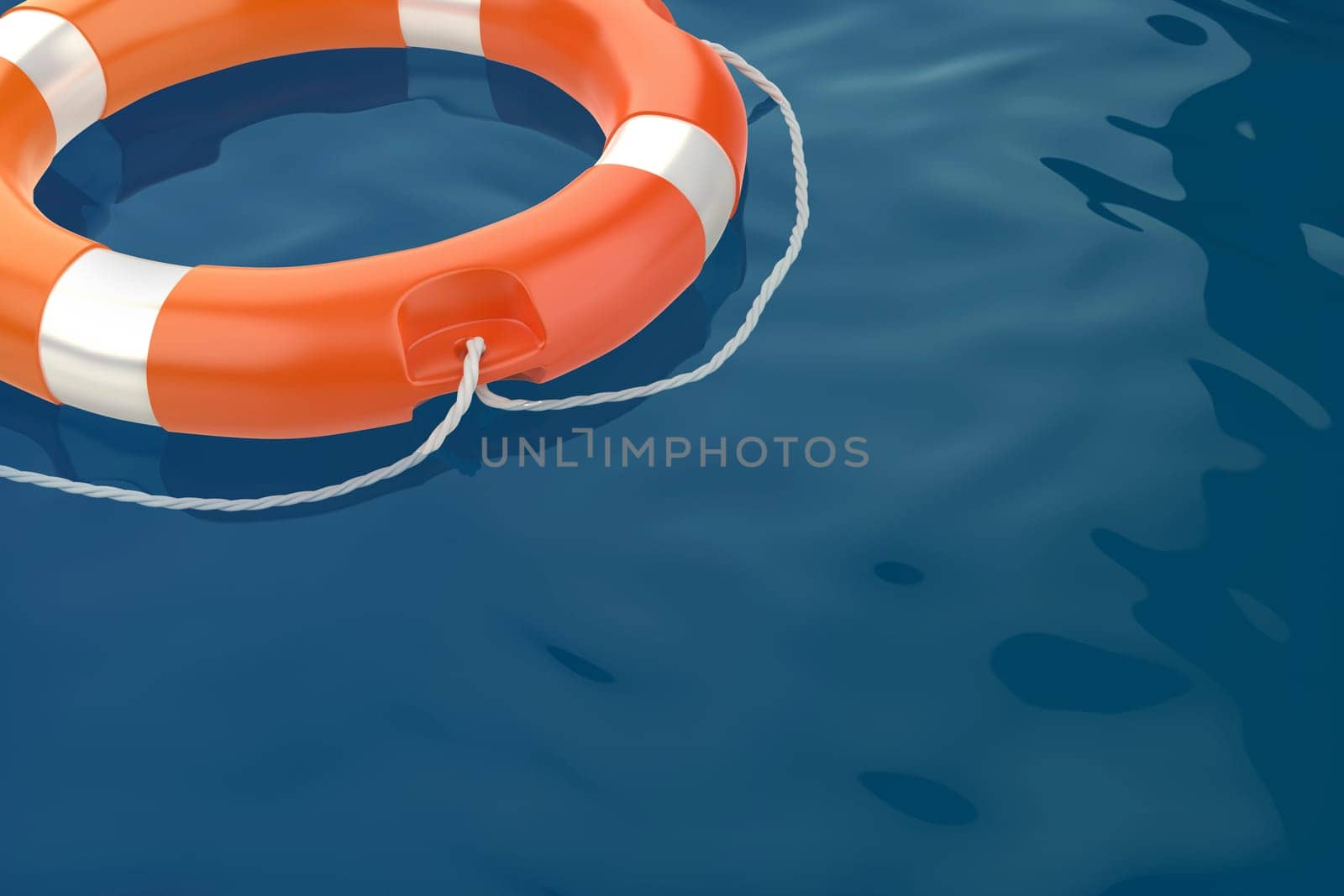 Orange lifebuoy ring in the ocean