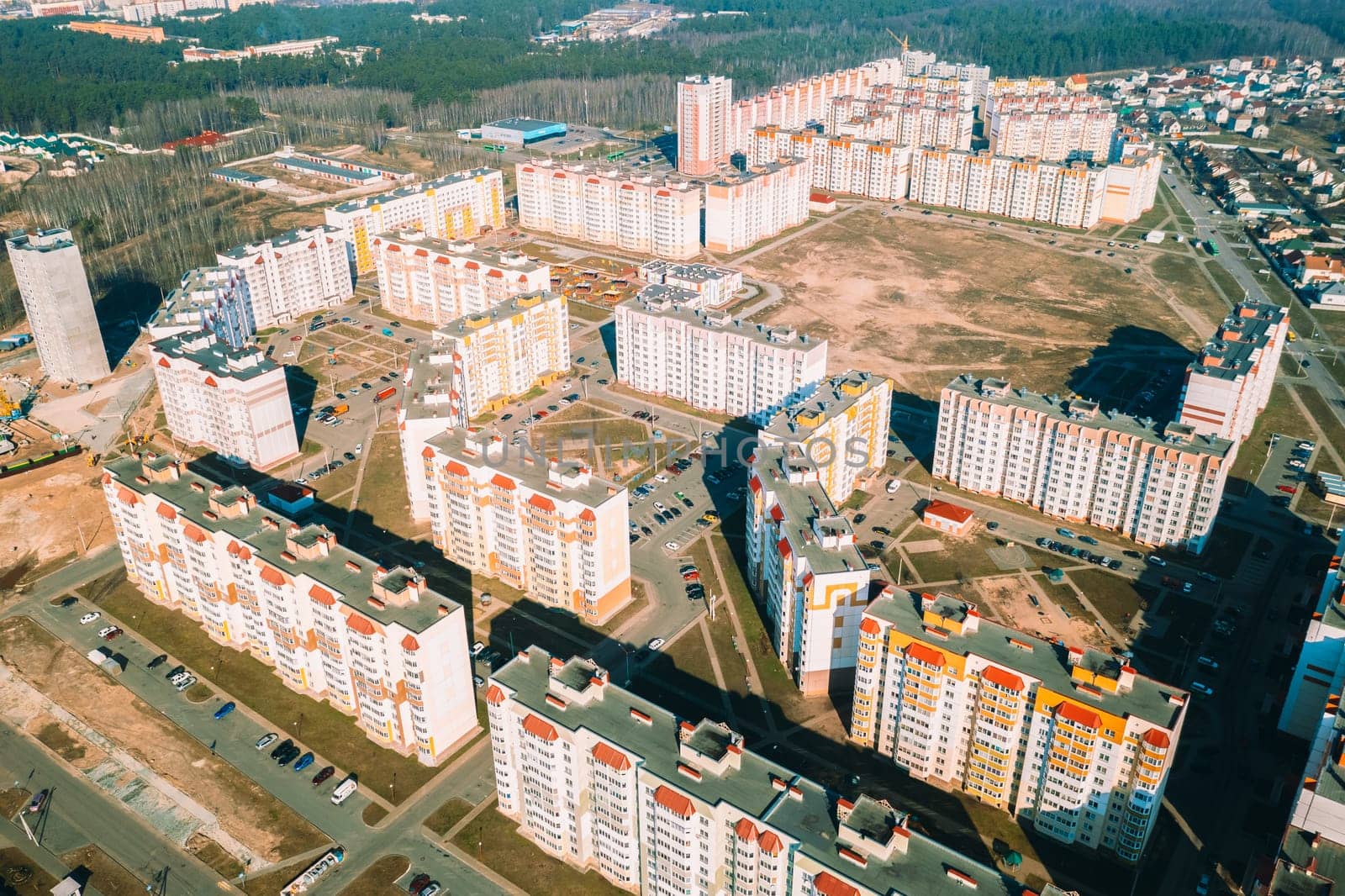 Gomel, Belarus. Aerial Bird's-eye View Of New Residential Multi-storey Houses. Cityscape Skyline In Sunny Spring Day. Real Estate, Development Industry. High-rise Buildings.