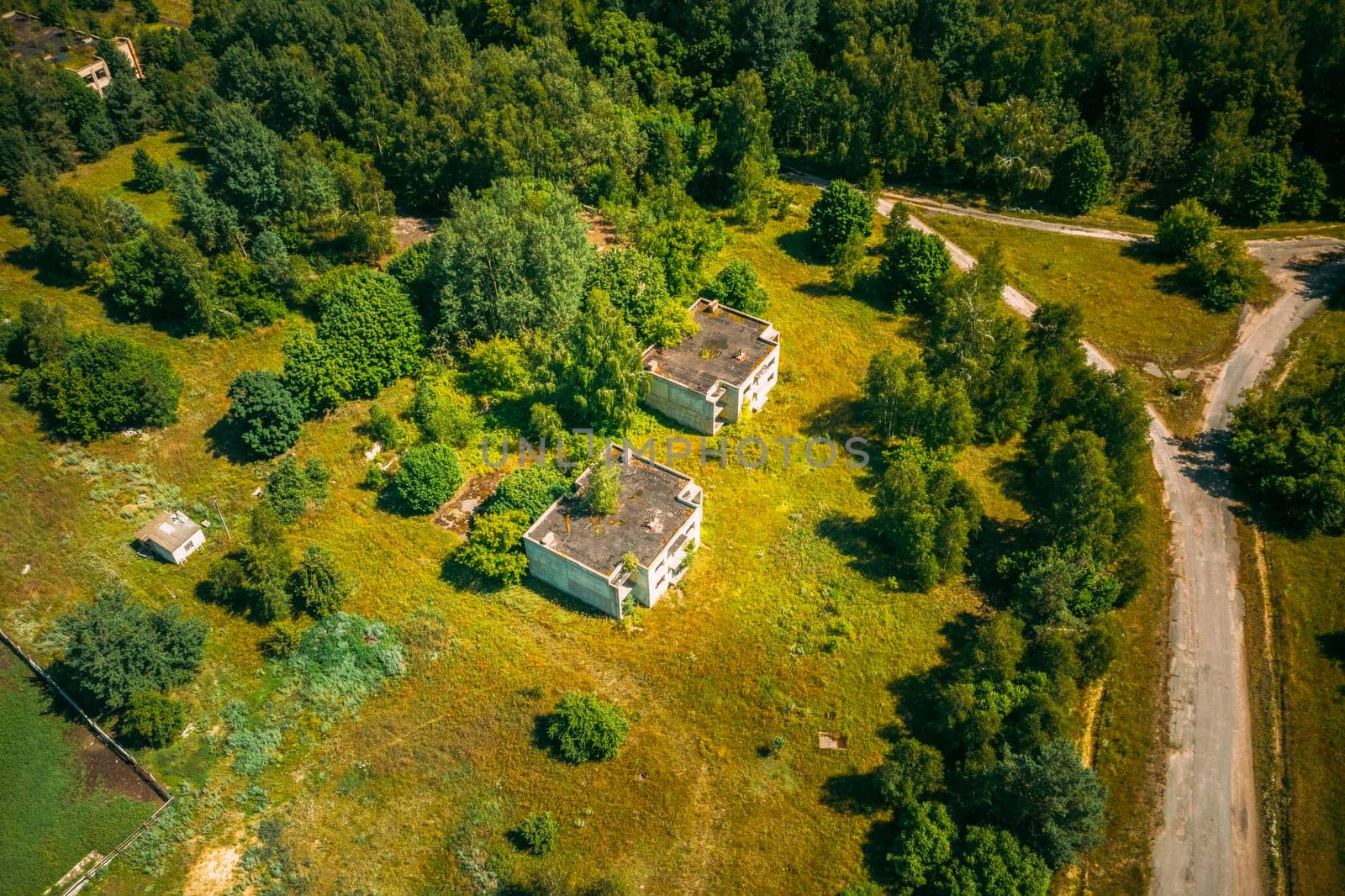 Belarus. Aerial View Of Abandoned Houses In Chernobyl Zone. Chornobyl Catastrophe Disasters. Dilapidated House In Belarusian Village. Whole Villages Must Be Disposed. Chernobyl Resettlement Zone.