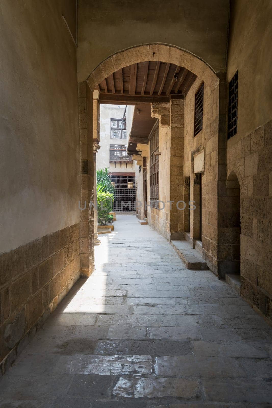 Stone bricks vaulted entrance of historic Beit El Sehemy house located in Moez street, Gamalia district, Cairo, Egypt