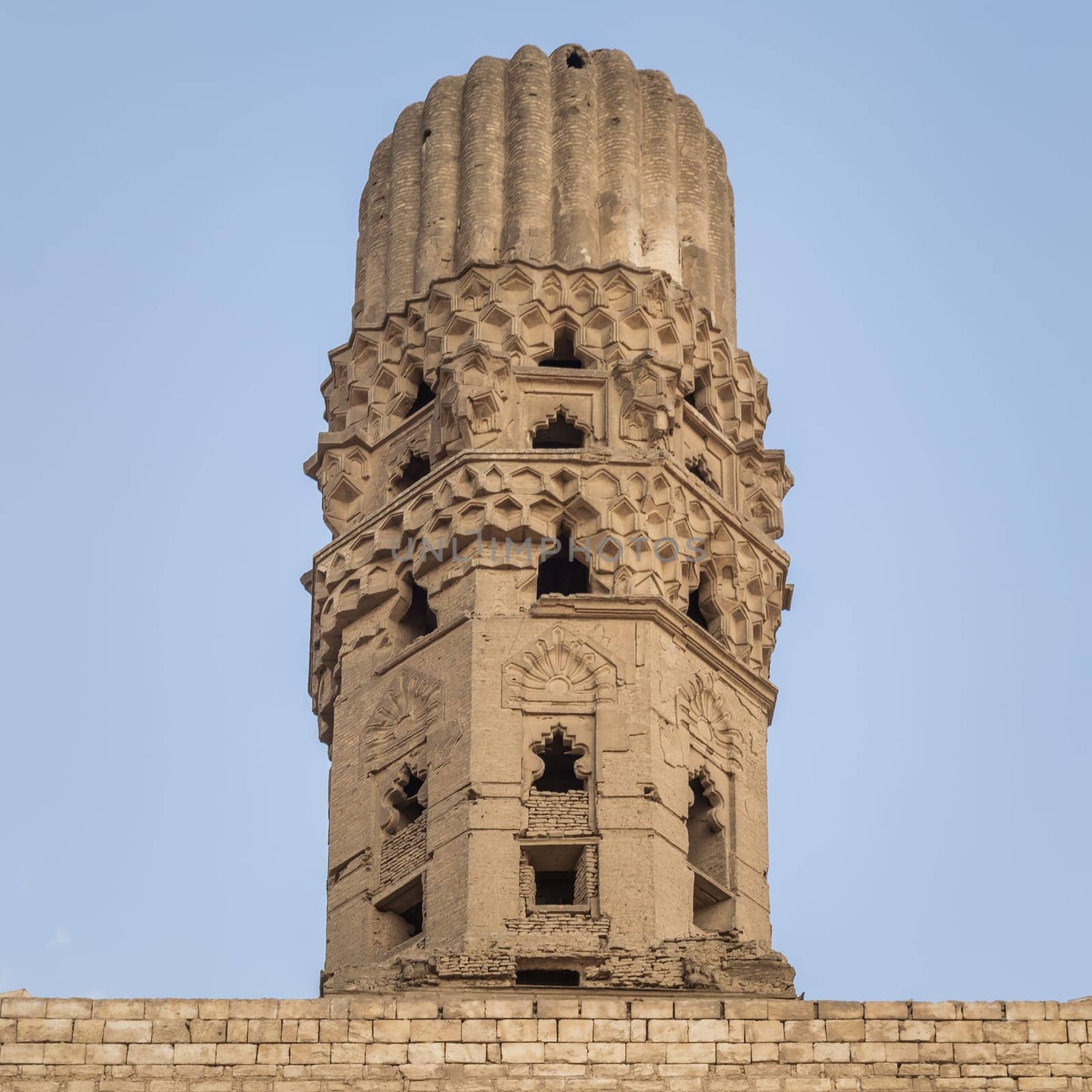Minaret of public historic Al Hakim Mosque known as The Enlightened Mosque, located in Moez Street, Old Cairo, Egypt