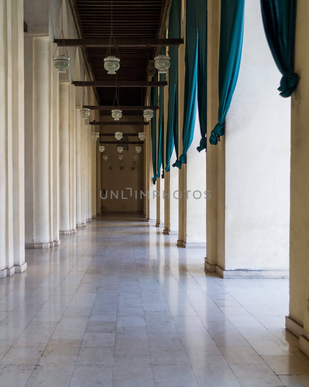 Corridor surrounding the courtyard of public historic Al Hakim Mosque known as The Enlightened Mosque, located in Moez Street, south of the old door of old Cairo gate named Bab Al-Futuh, Egypt