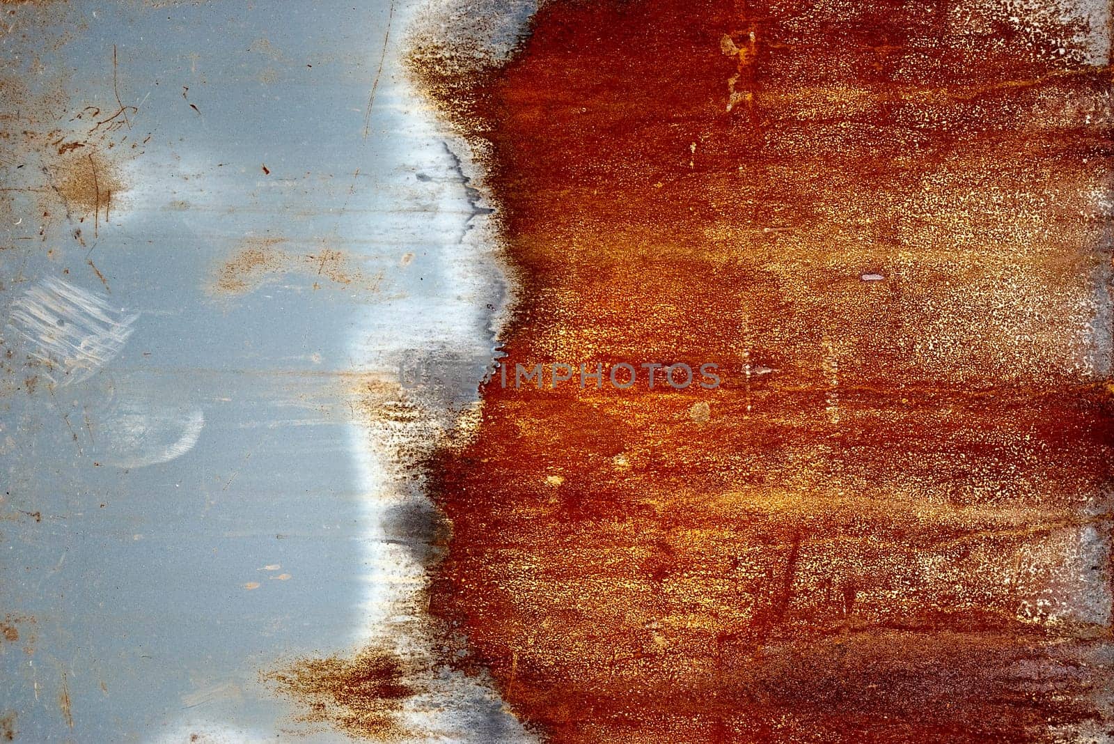 Rusty vintage colored grunge iron textured background