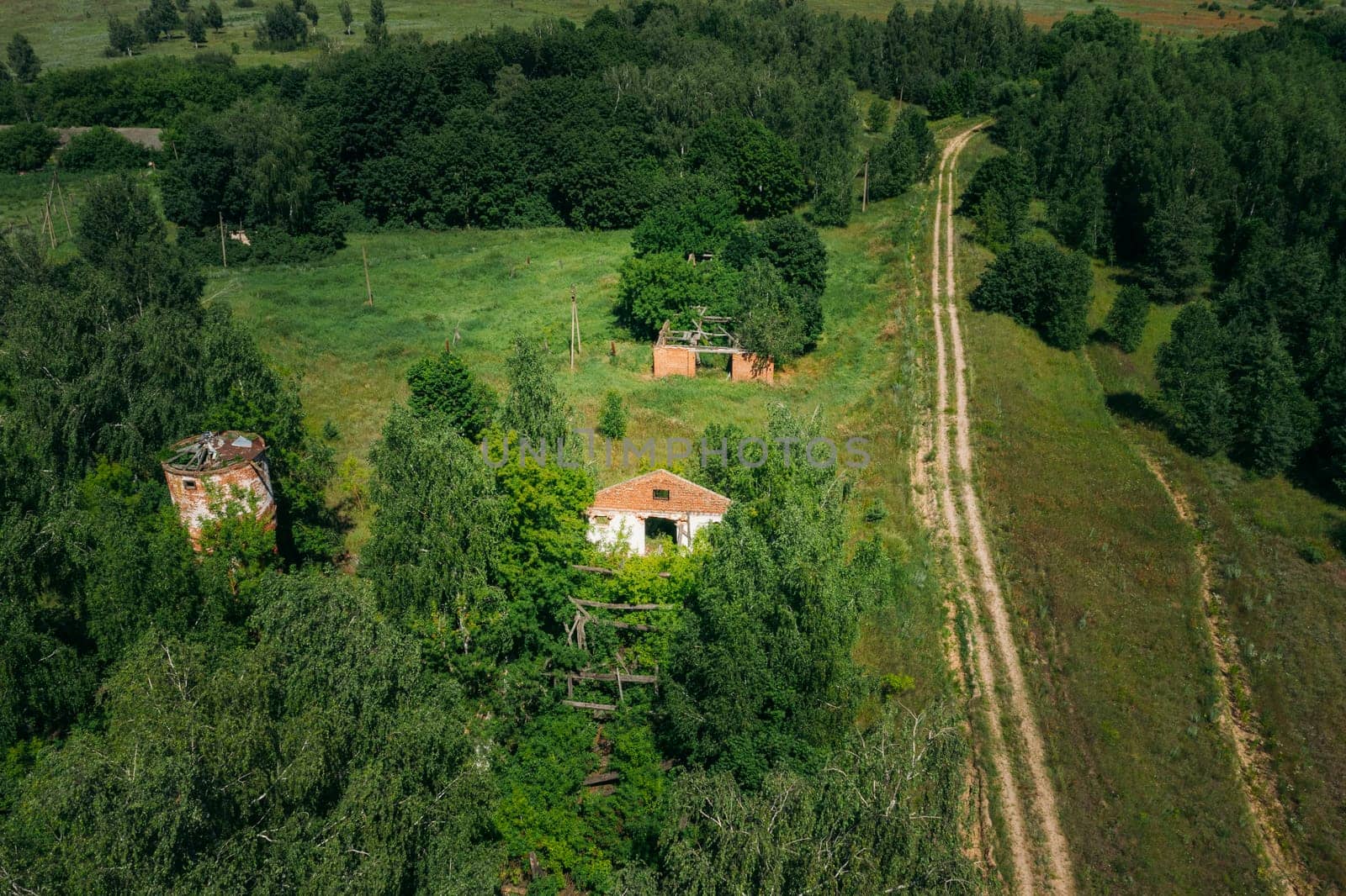 Belarus. Aerial View Of Ruined Cowshed In Chernobyl Zone. Chornobyl Catastrophe Disasters. Dilapidated House In Belarusian Village. Whole Villages Must Be Disposed. Chernobyl Resettlement Zone.
