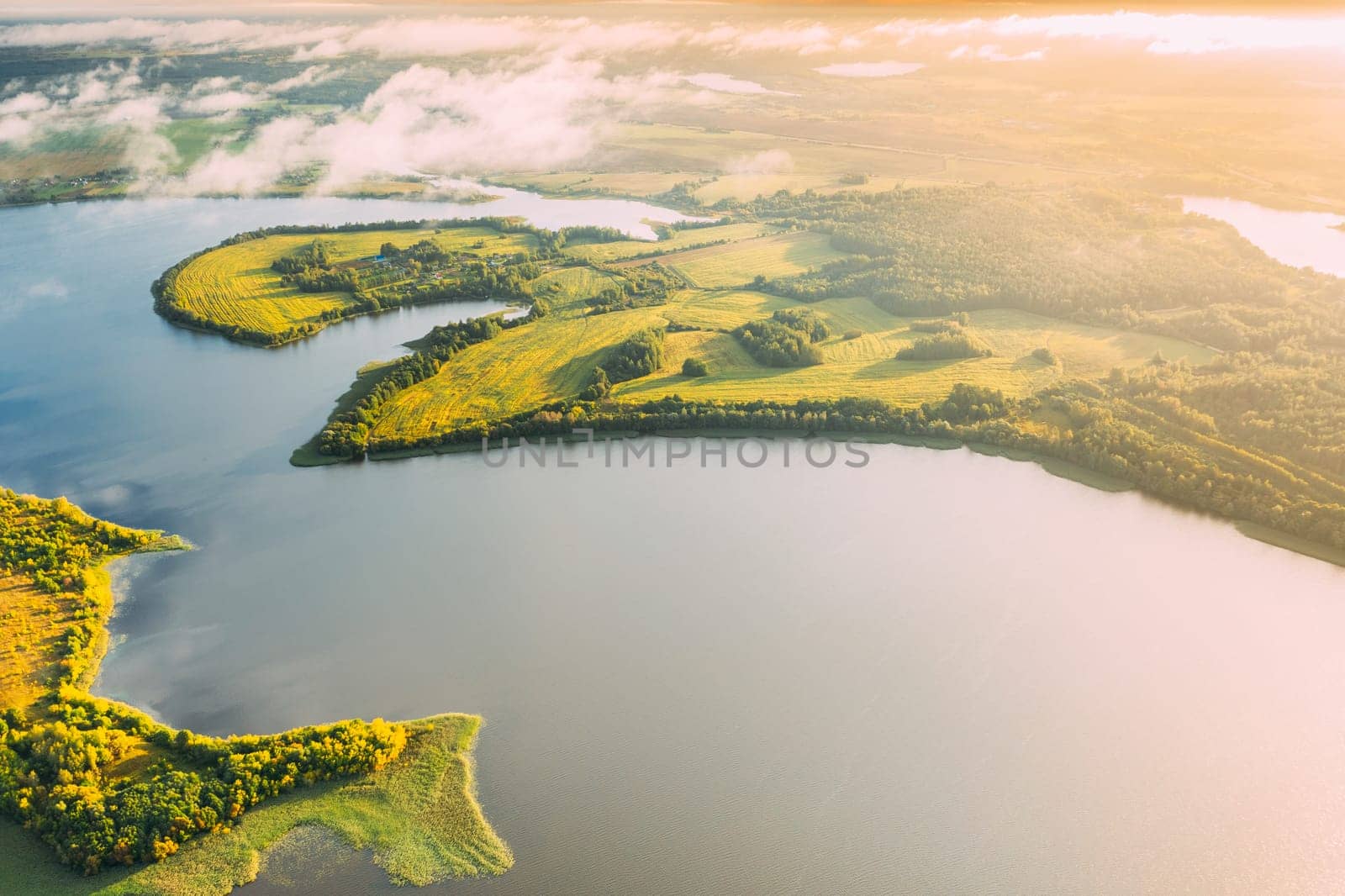 Lyepyel District, Vitebsk Region, Belarus. Aerial View Of Residential Area With Houses In Countryside. Morning Fog Above Lepel Lake.
