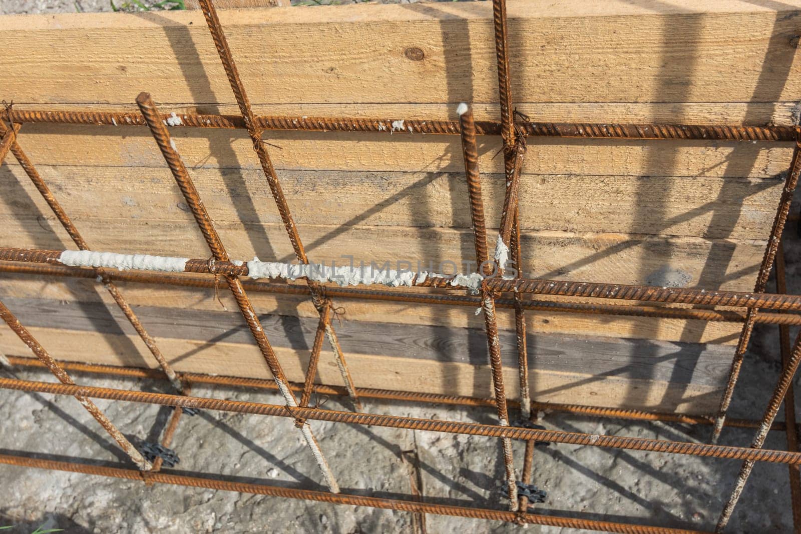 Tied reinforcement and mounted strip foundation formwork close-up