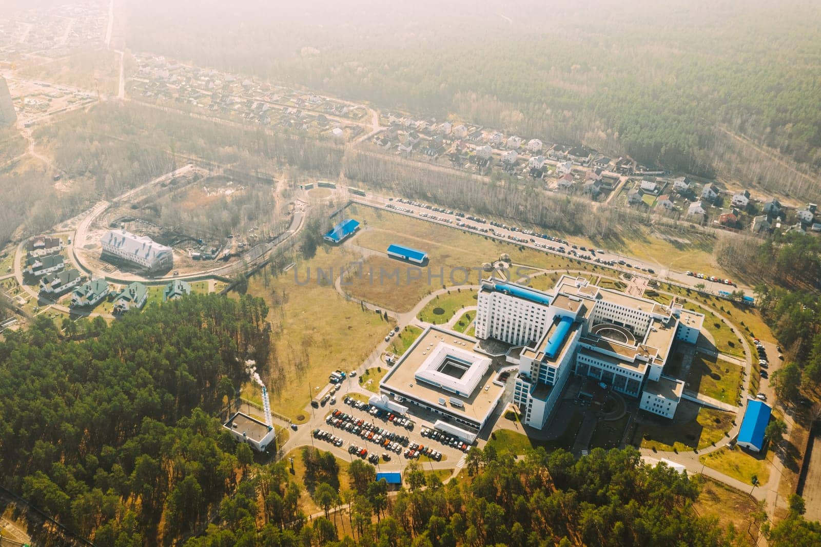 Gomel, Belarus. Aerial View OF Building Of Republican Scientific Center For Radiation Medicine And Human Ecology In Spring Sunny Day. Top View. Drone View. Bird's Eye View.