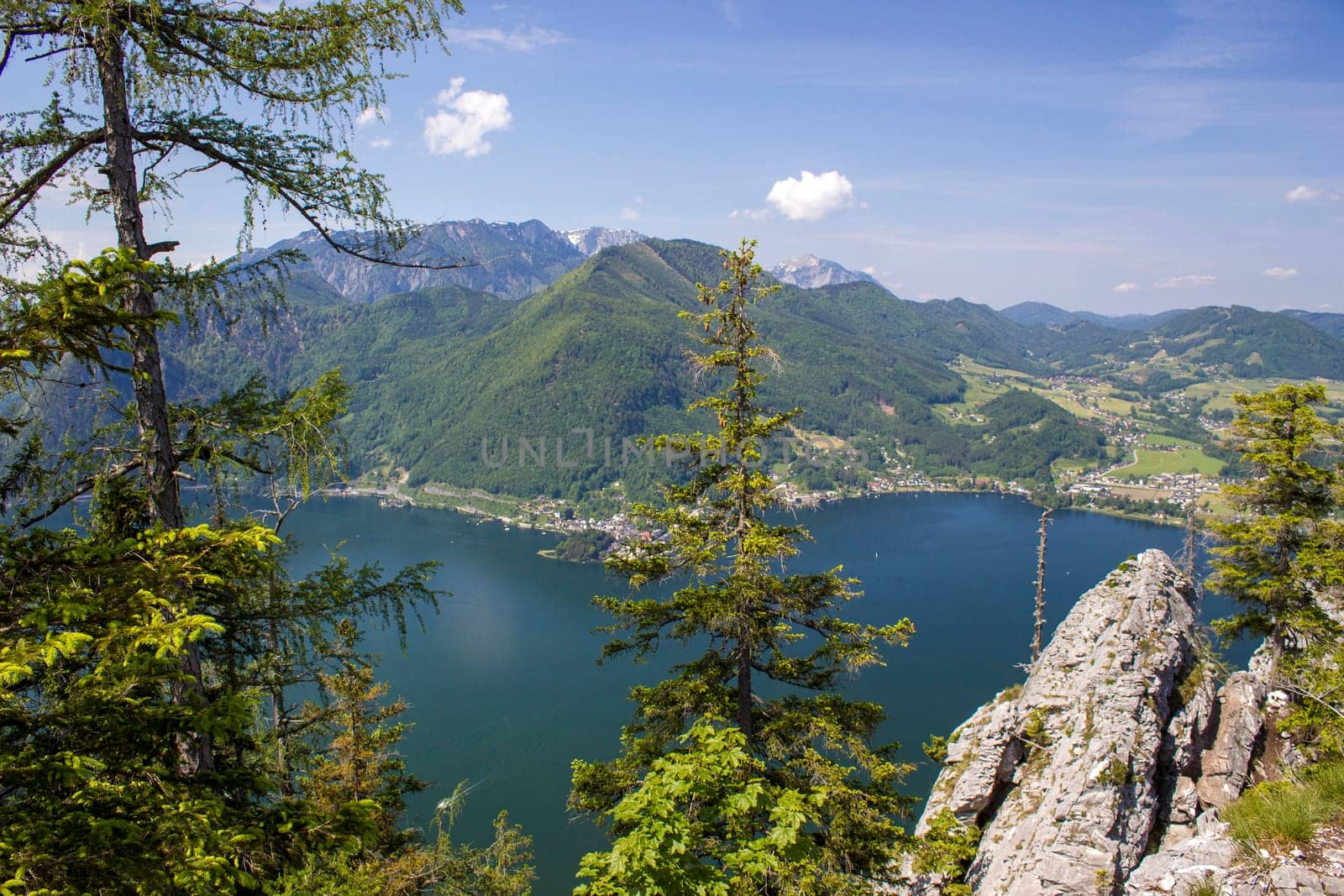 Traunsee lake with alps mountain and city Traunkirchen from hill Kleiner Schonberg. Austria landscape. Upper Austria, Austria