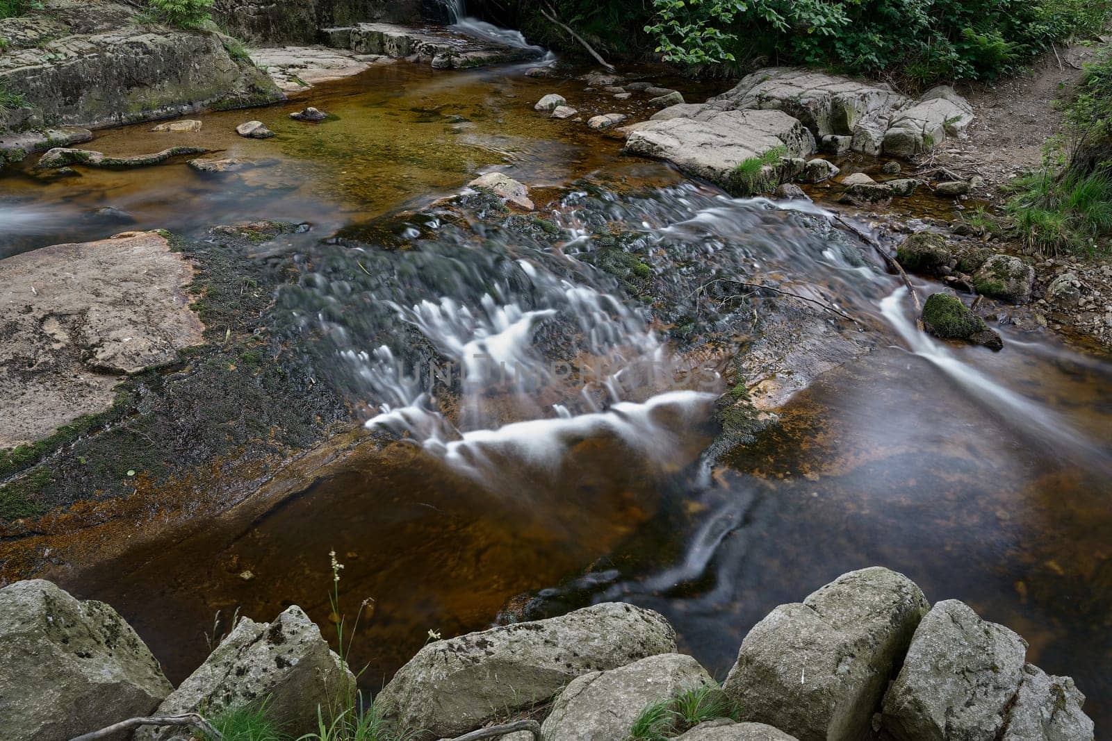 the romantic river Ilse near Ilsenburg at the foot of the Brocken in the Harz National Park in Germany
