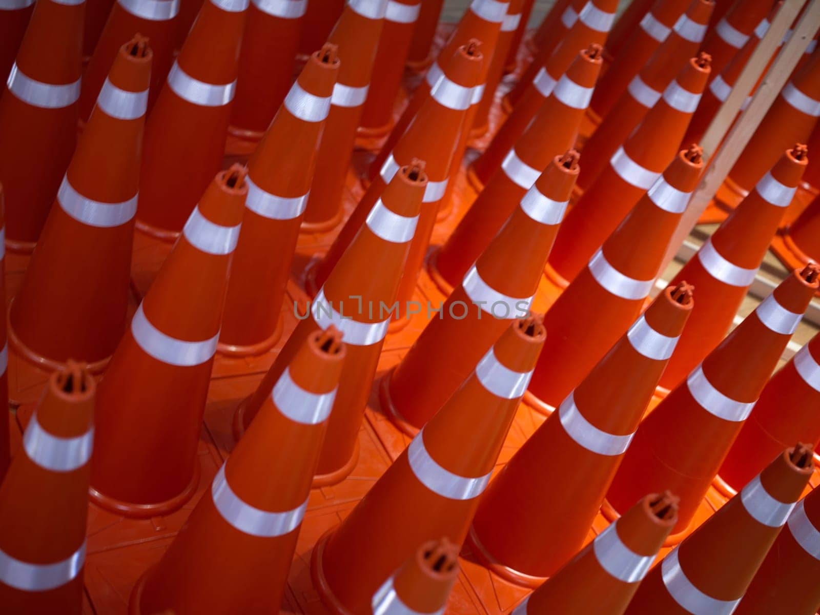 A row of traffic cones background . Concept  traffic