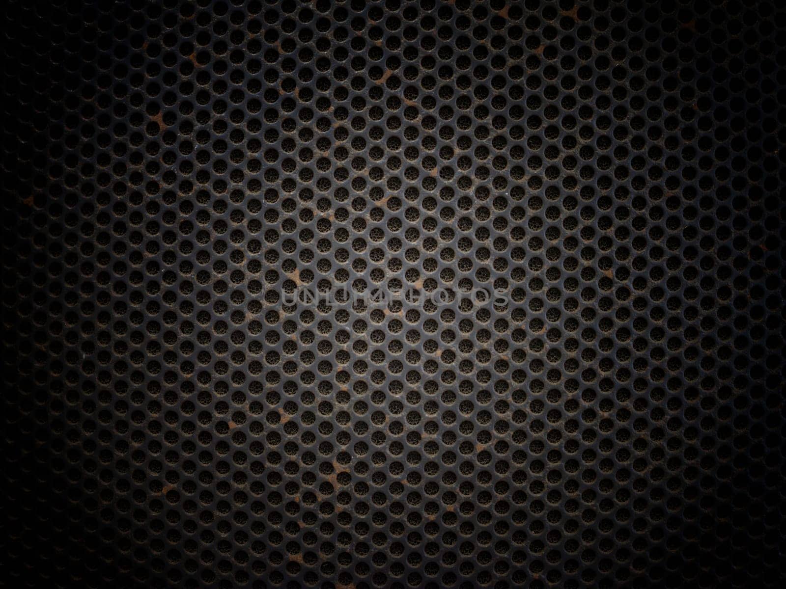 Fragment of the speaker with a metal perforated grille. Great background for advertising and MUSIC Festival .