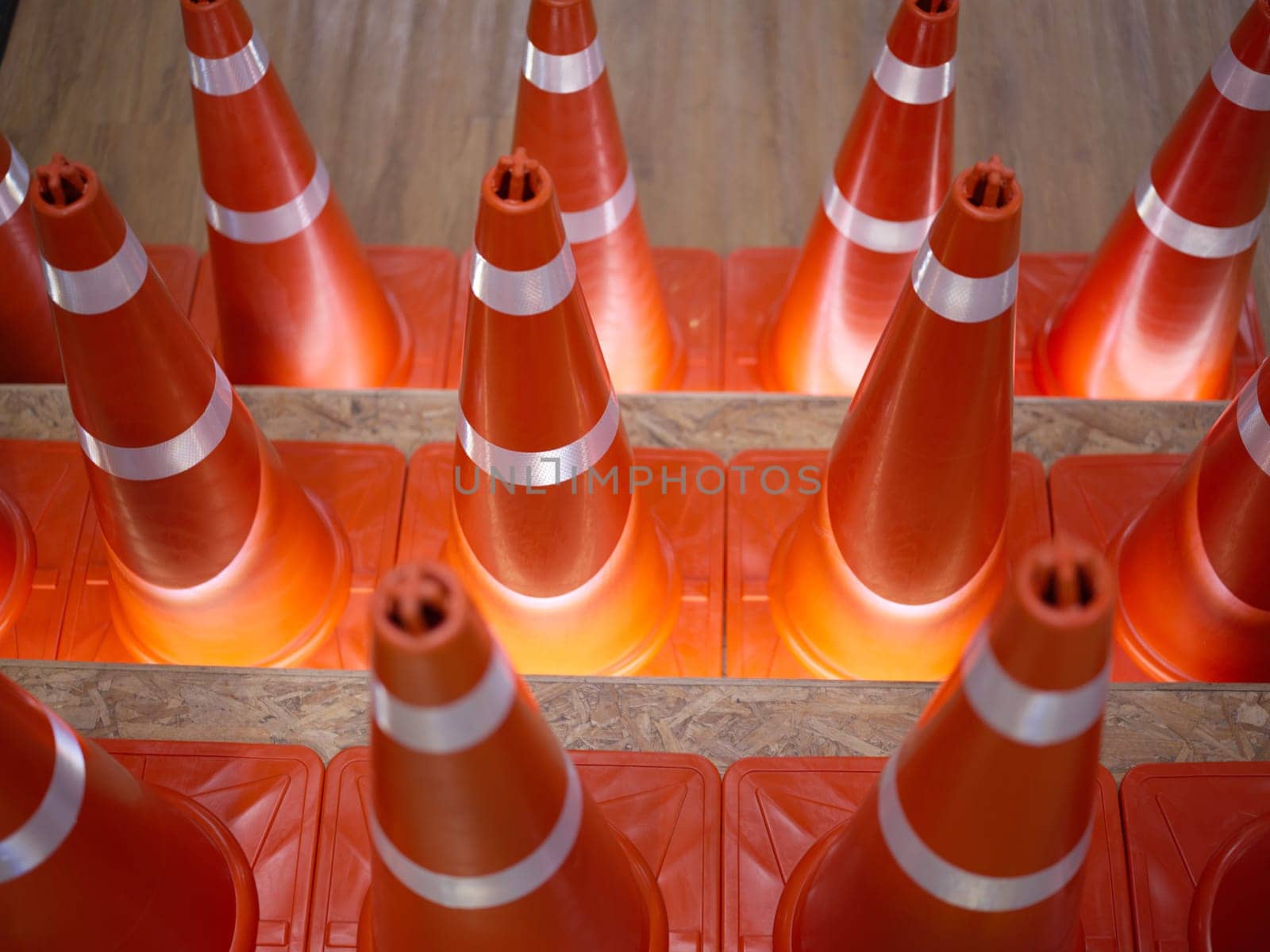 A row of traffic cones background . Concept  traffic