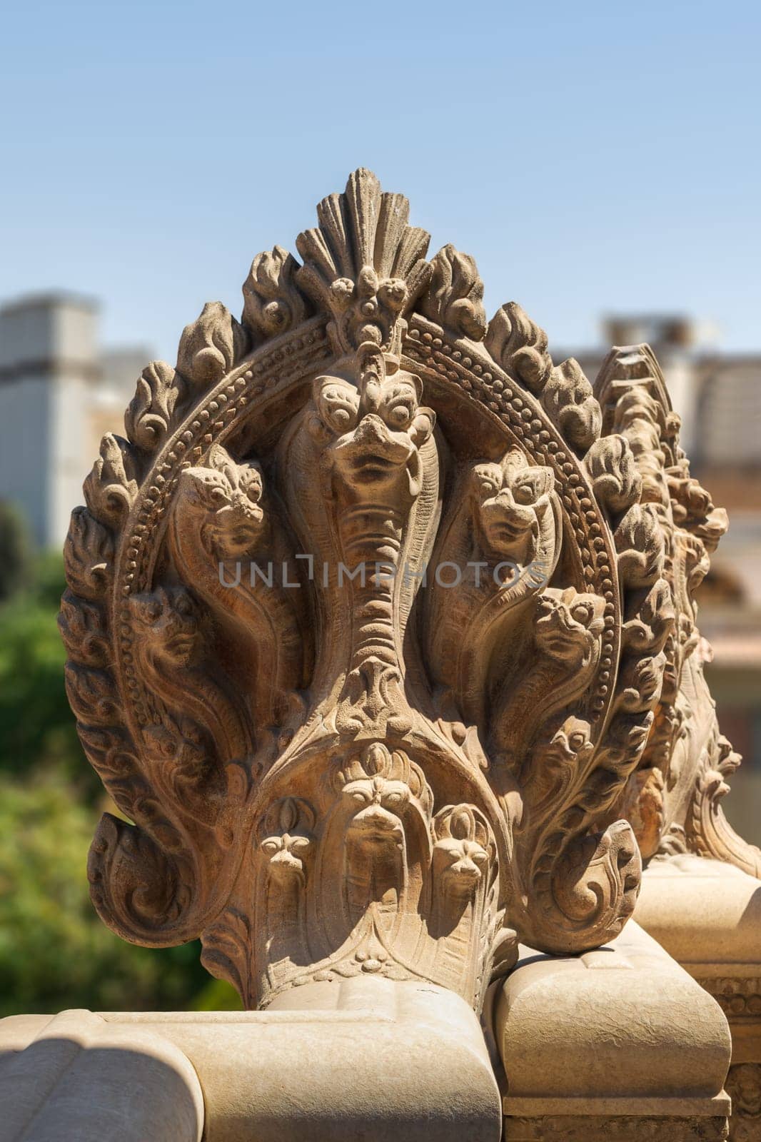 Hindu statue of snakes. One of the statues studding the terrace of the historical palace of Baron Empain, Cairo, Egypt