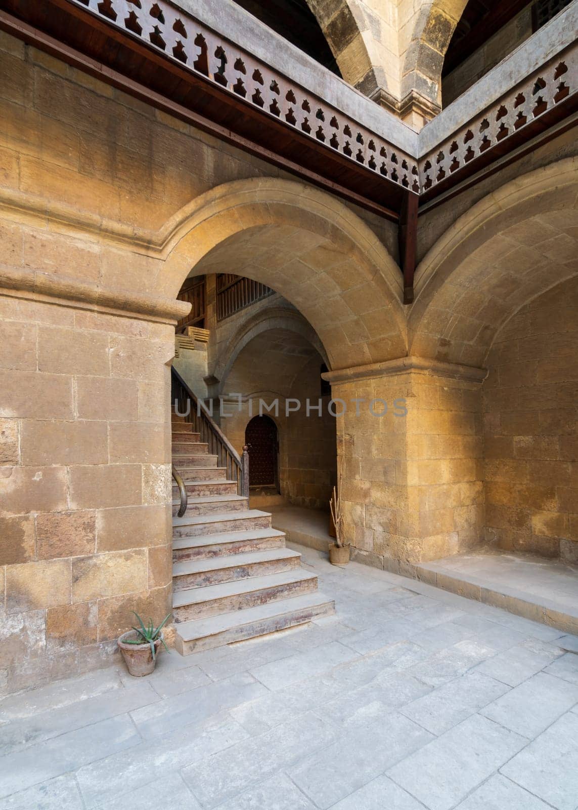 Exterior daylight shot of staircase going up leading to Caravansary - Wikala - of Bazaraa, suited in Gamalia district, Medieval Cairo, Egypt