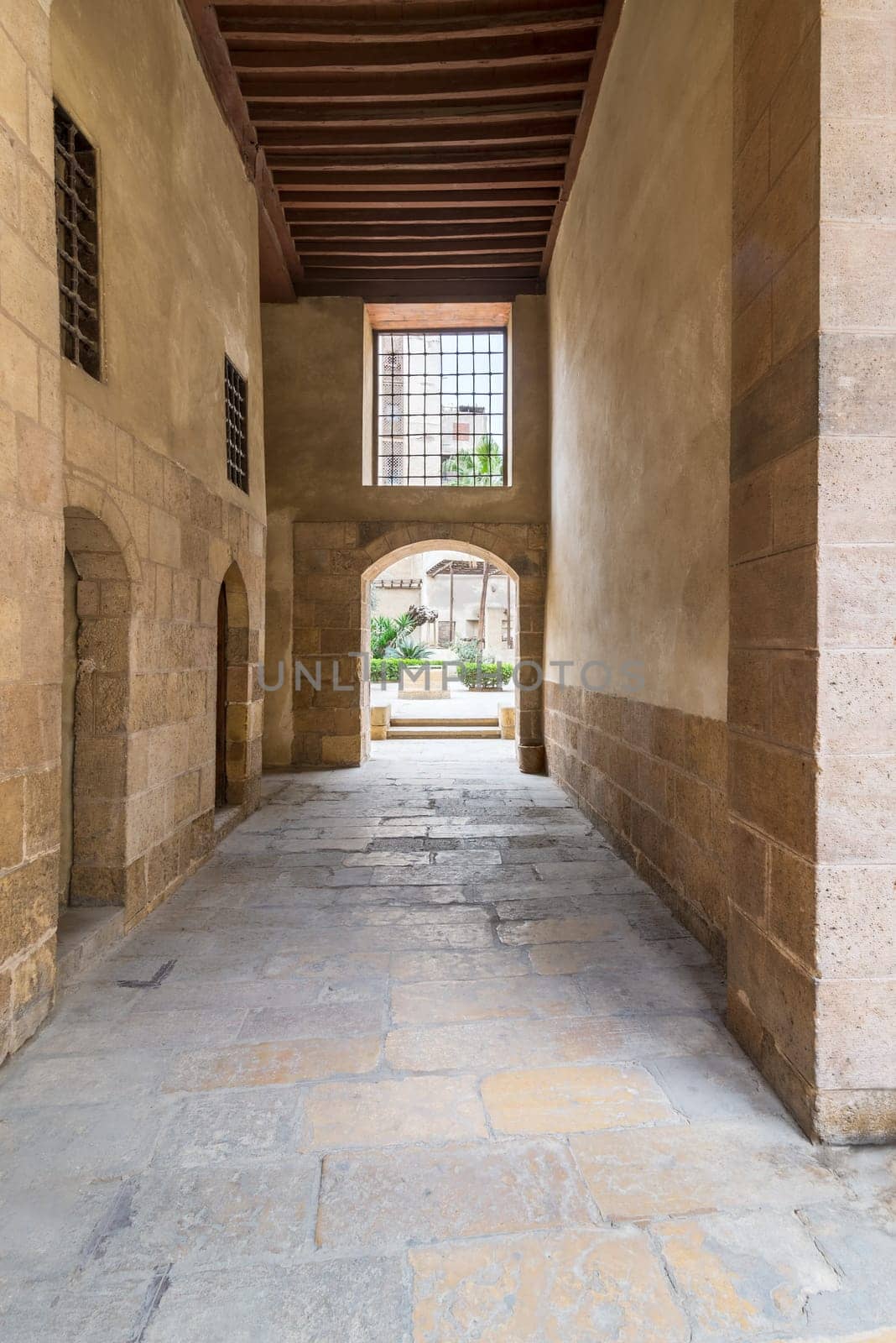 Stone bricks passage leading to the courtyard of historic Beit El Sehemy house located in Moez street, Gamalia district, Cairo, Egypt