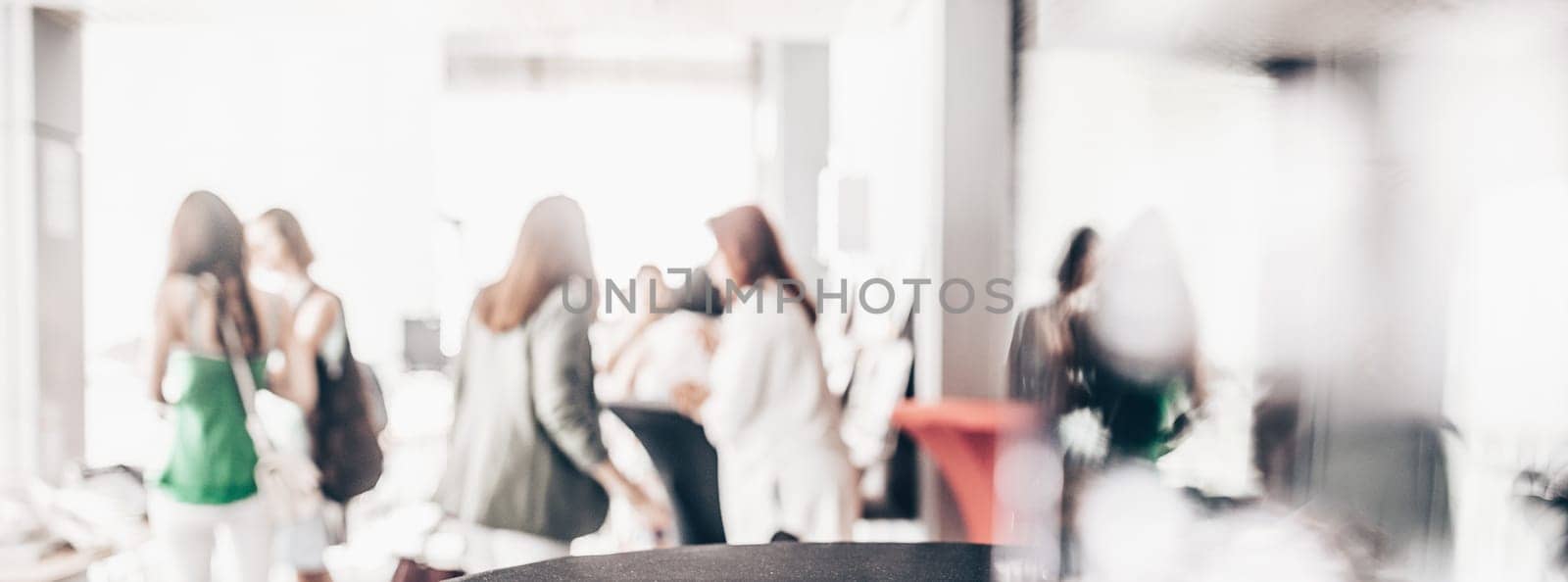 Blured image of businesspeople at coffee break at conference meeting. Business and entrepreneurship.
