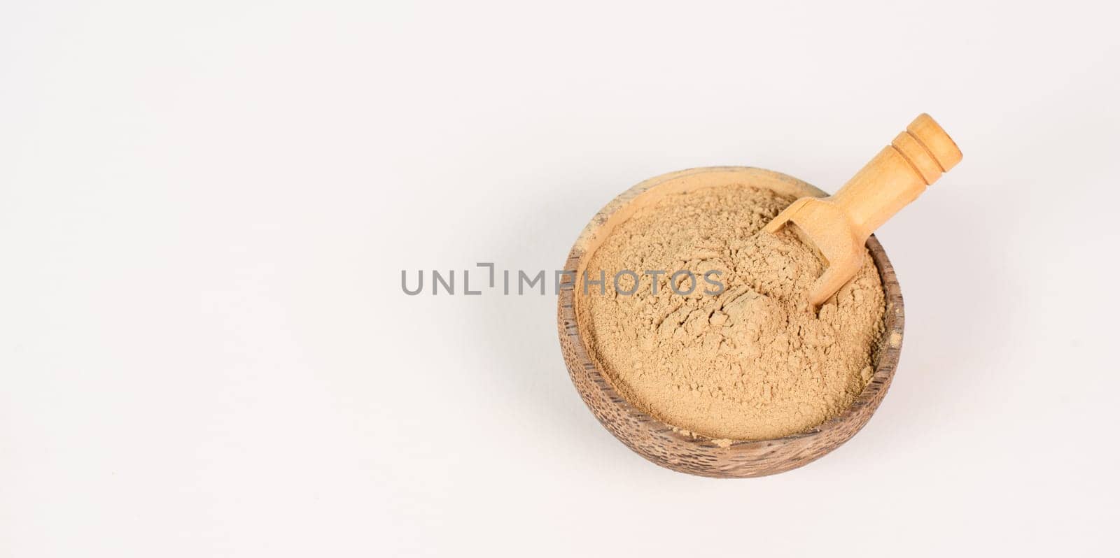 Healing earth powder in a bowl, supplement and antioxidant for to detox the body, alternative medicine