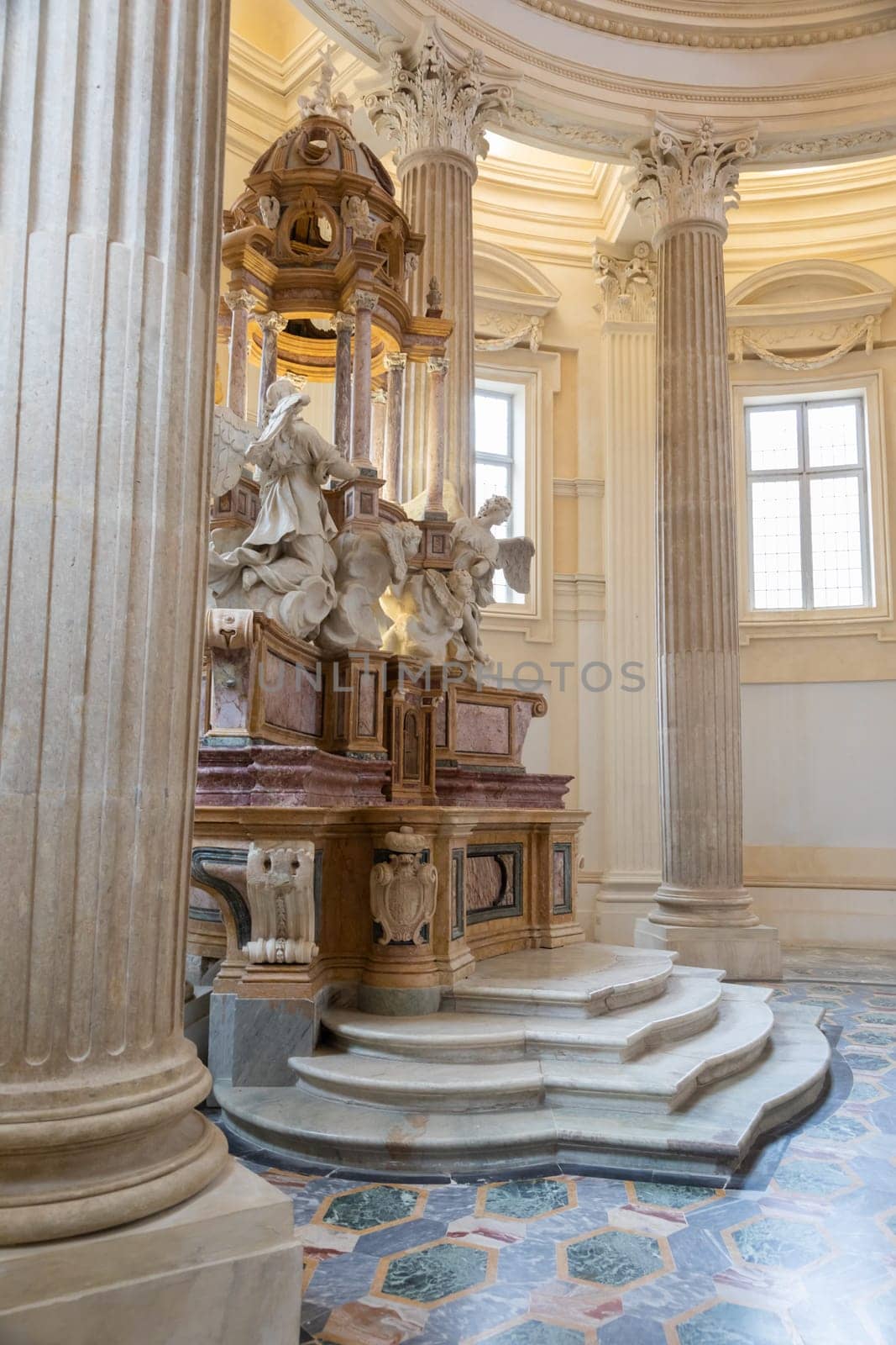 VENARIA REALE, ITALY - Circa January 2022: Baroque catholic church altar. Old interior religious building.