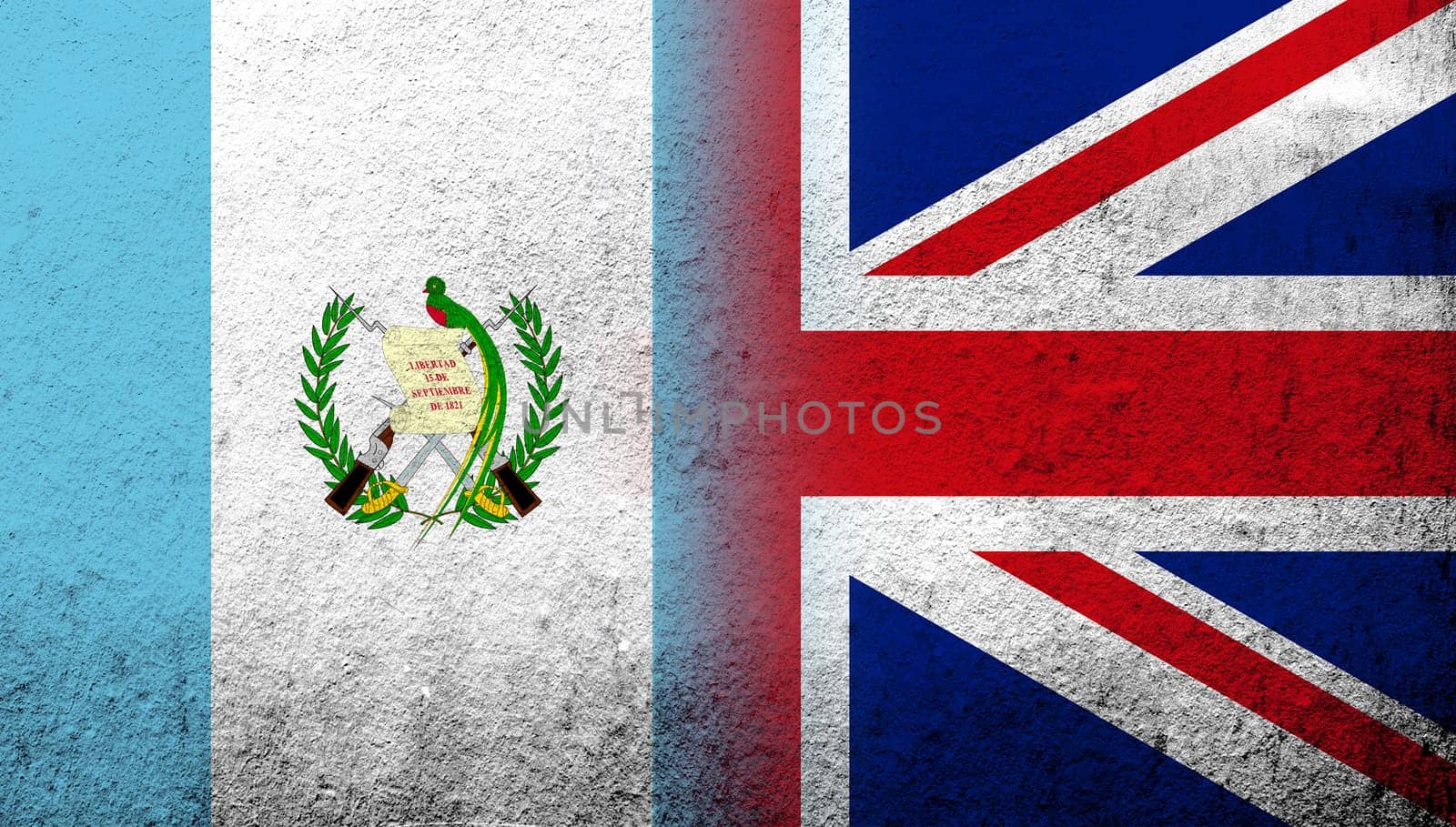National flag of United Kingdom (Great Britain) Union Jack with Guatemala National flag. Grunge background