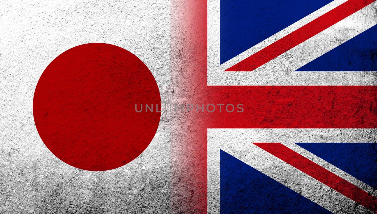 National flag of United Kingdom (Great Britain) Union Jack with National flag of Japan. Grunge background